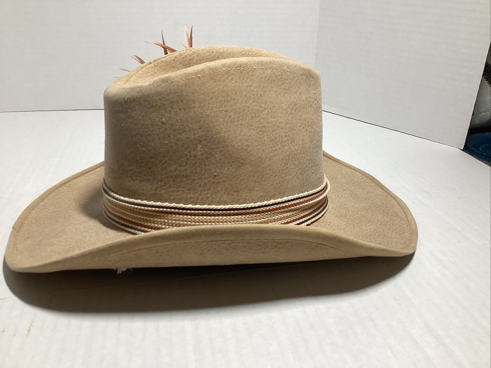 VTG Western Cowboy hat, Size Small, Head Measures 8 By 6 Inches, Tan, Feathers