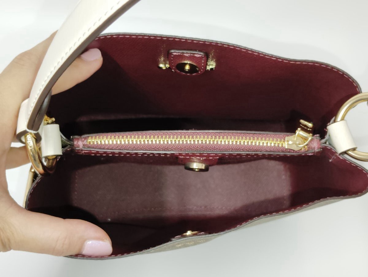 Coach Authentic Signature Small Town Bucket Bag Elevate your everyday style