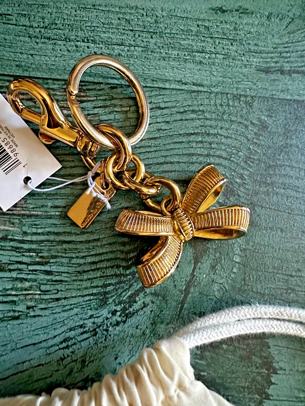 NWT Coach CEM83 Bow Bag Charm Gold/Gold CEM83 with Dust bag🎀