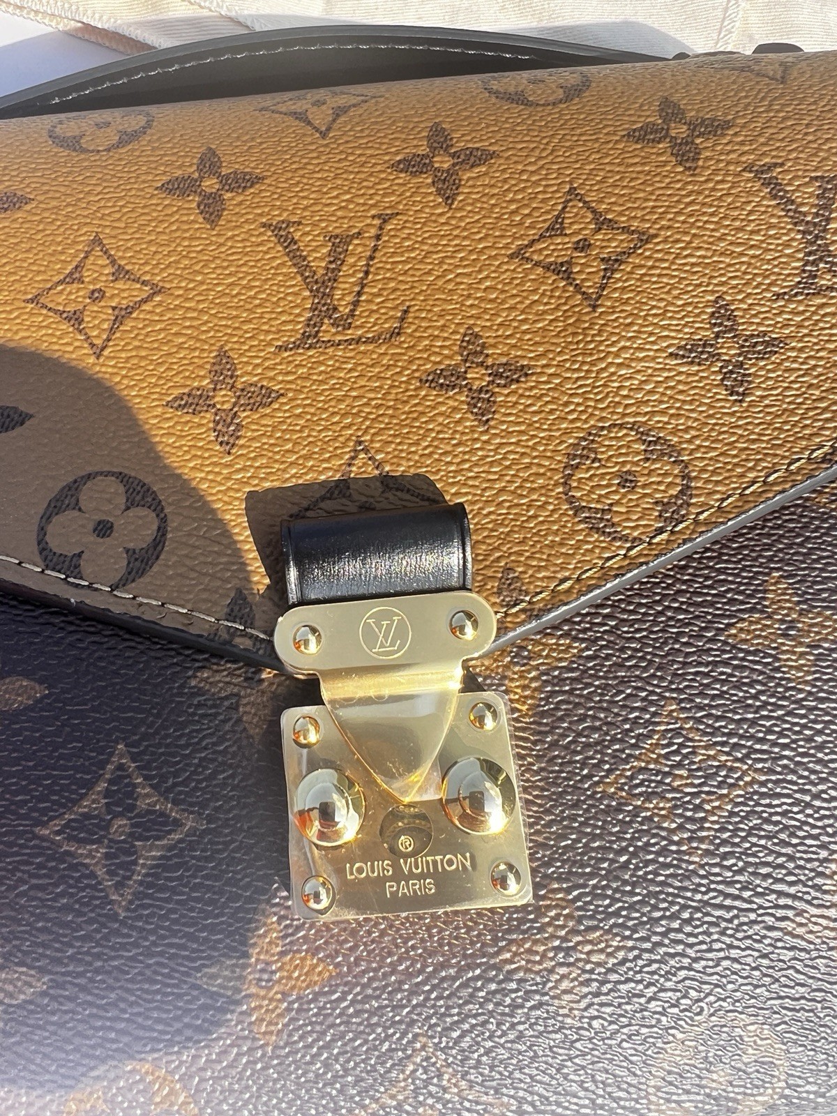 Louis Vuitton Pochette Métis Reverse Monogram Brown/Tan Satchel Push Lock