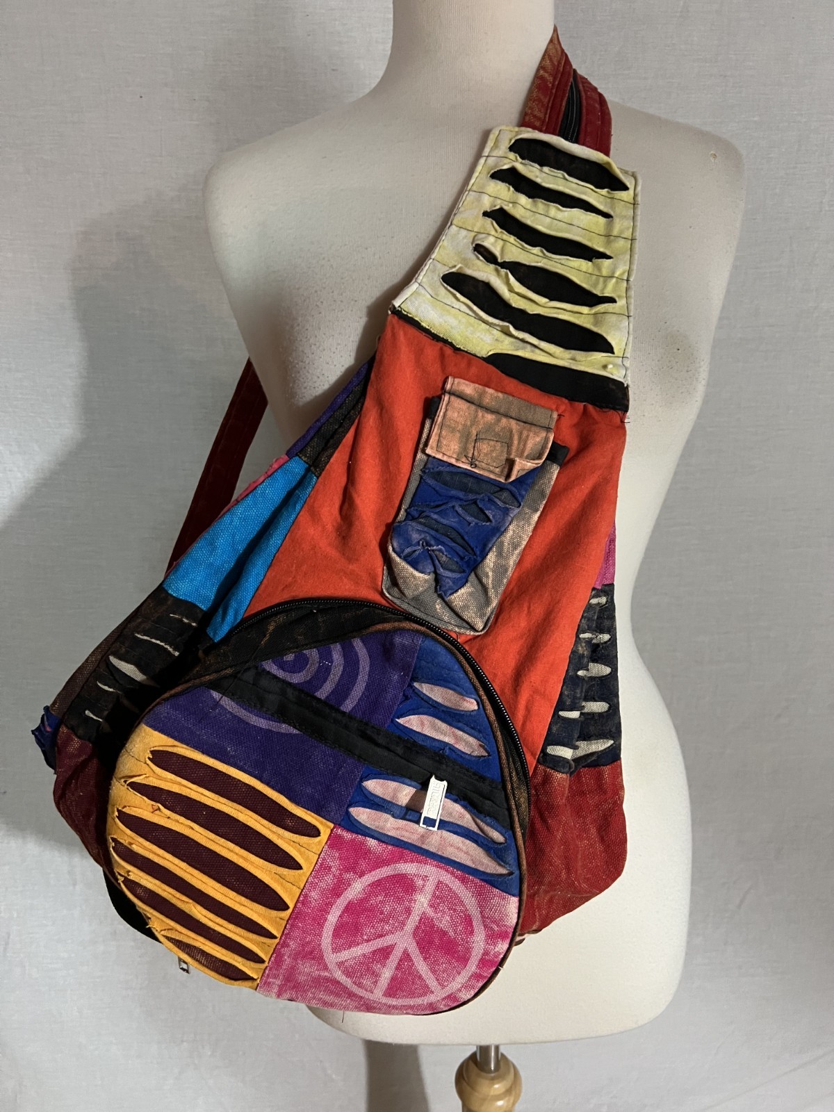 NWOT Patchwork Cotton Fold up Backpack Stonewash Multicolor Peace Sign ~15 x16″