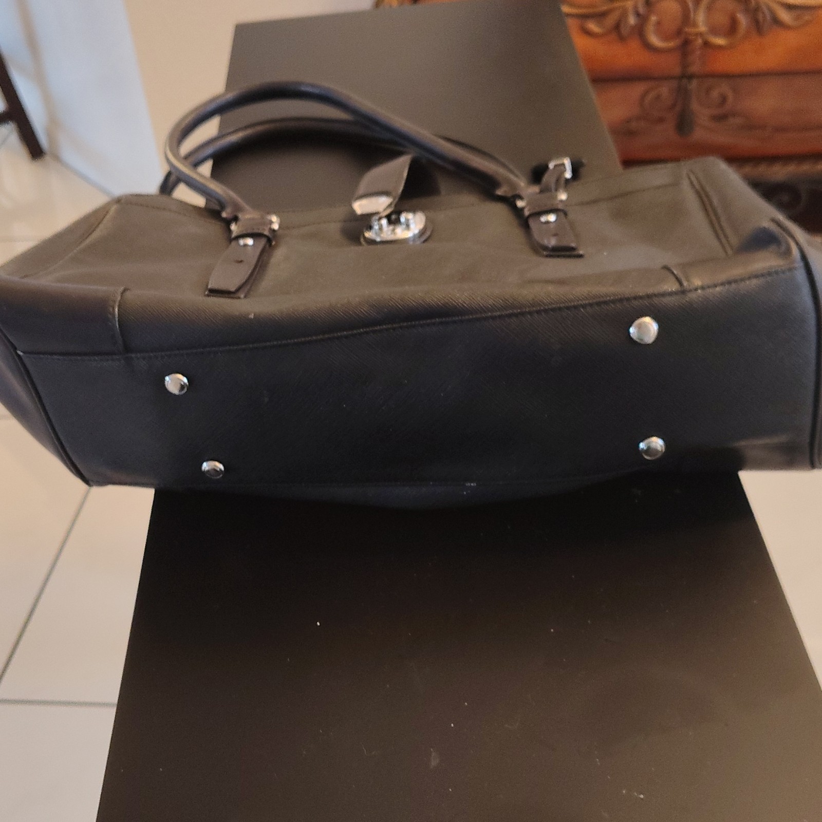 Tumi Black Buckle Accent Women’s Tote with Inner Pockets & Bottom Studs