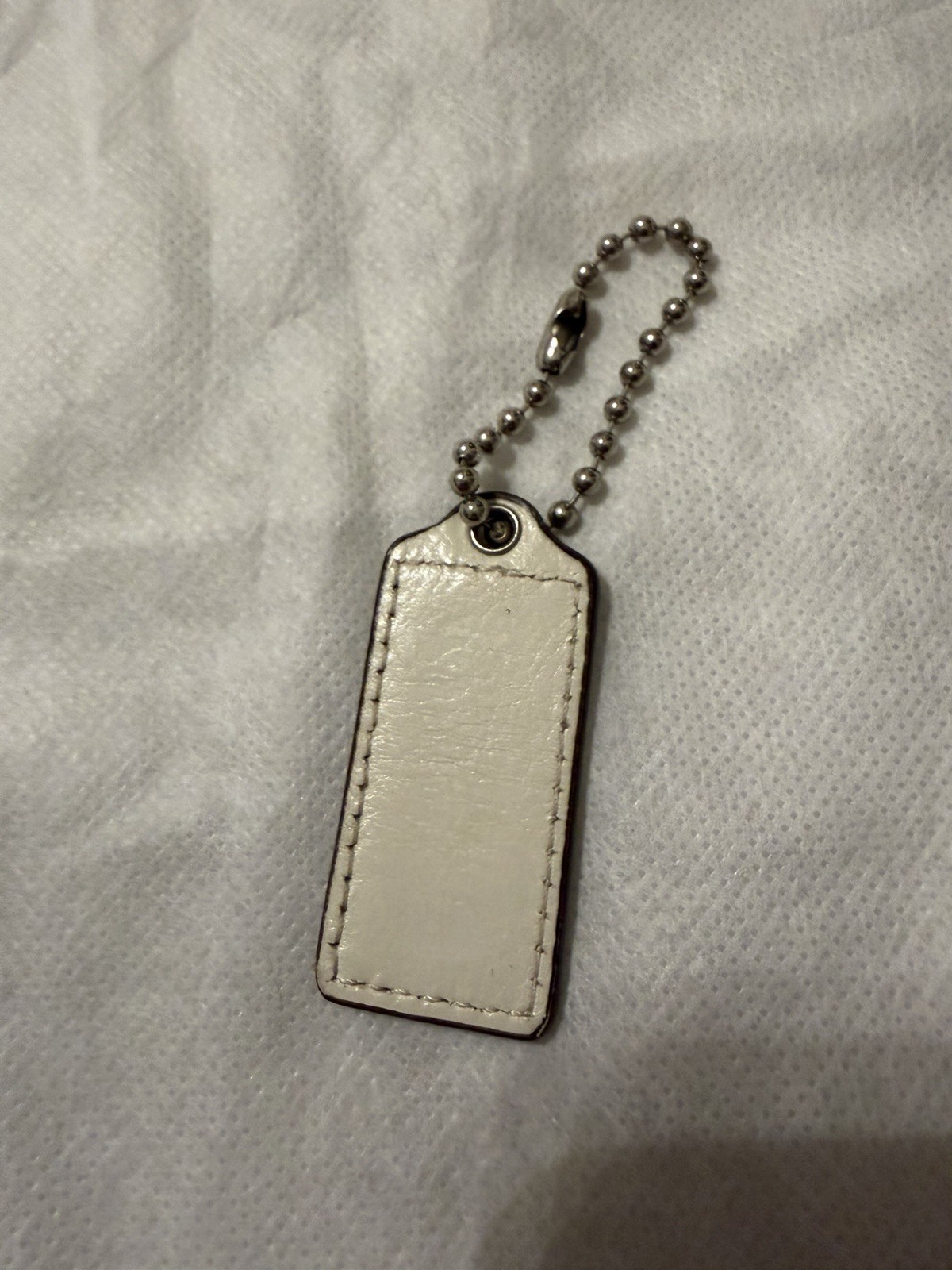 Coach Hang Tag