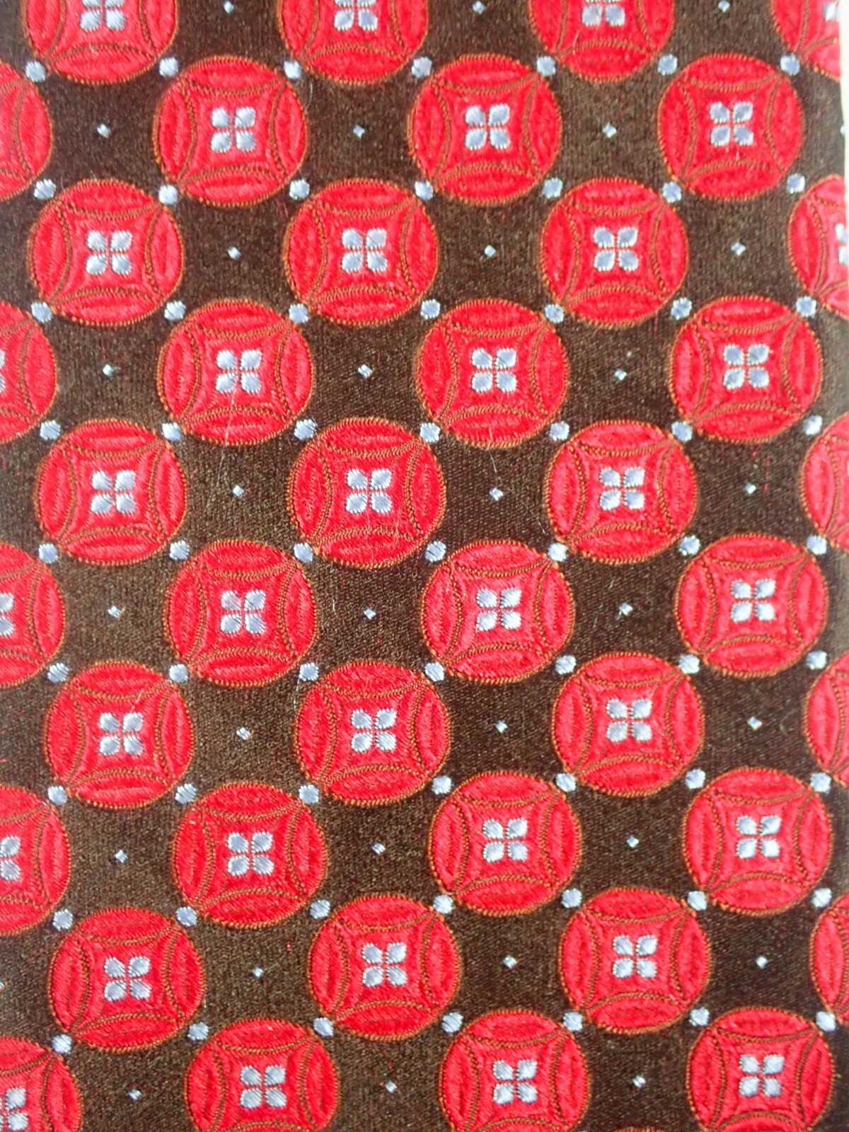 IKE BEHAR BLACK w/ RED CIRCLES & BLUE CENTERS 100% SILK NECK TIE