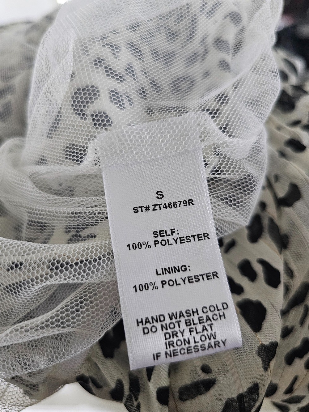 Size S Women’s Black and White Leopard Print Blouse