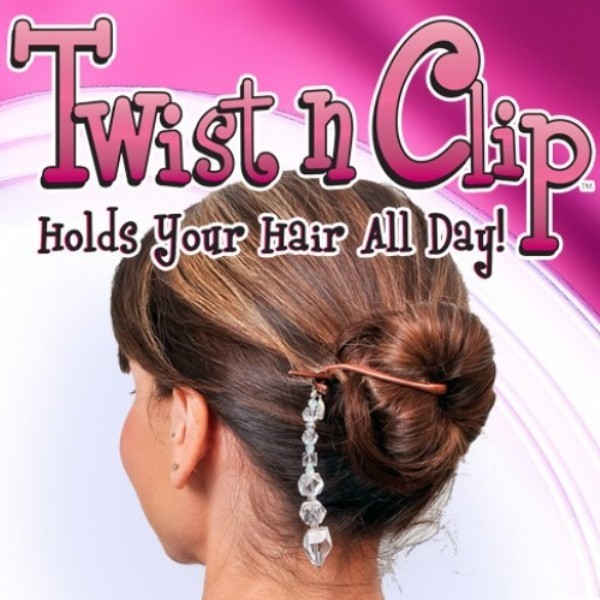 2 boxes of Twist n Clip sets total 8 Twist n Clips. Holds Your Hair All Day!