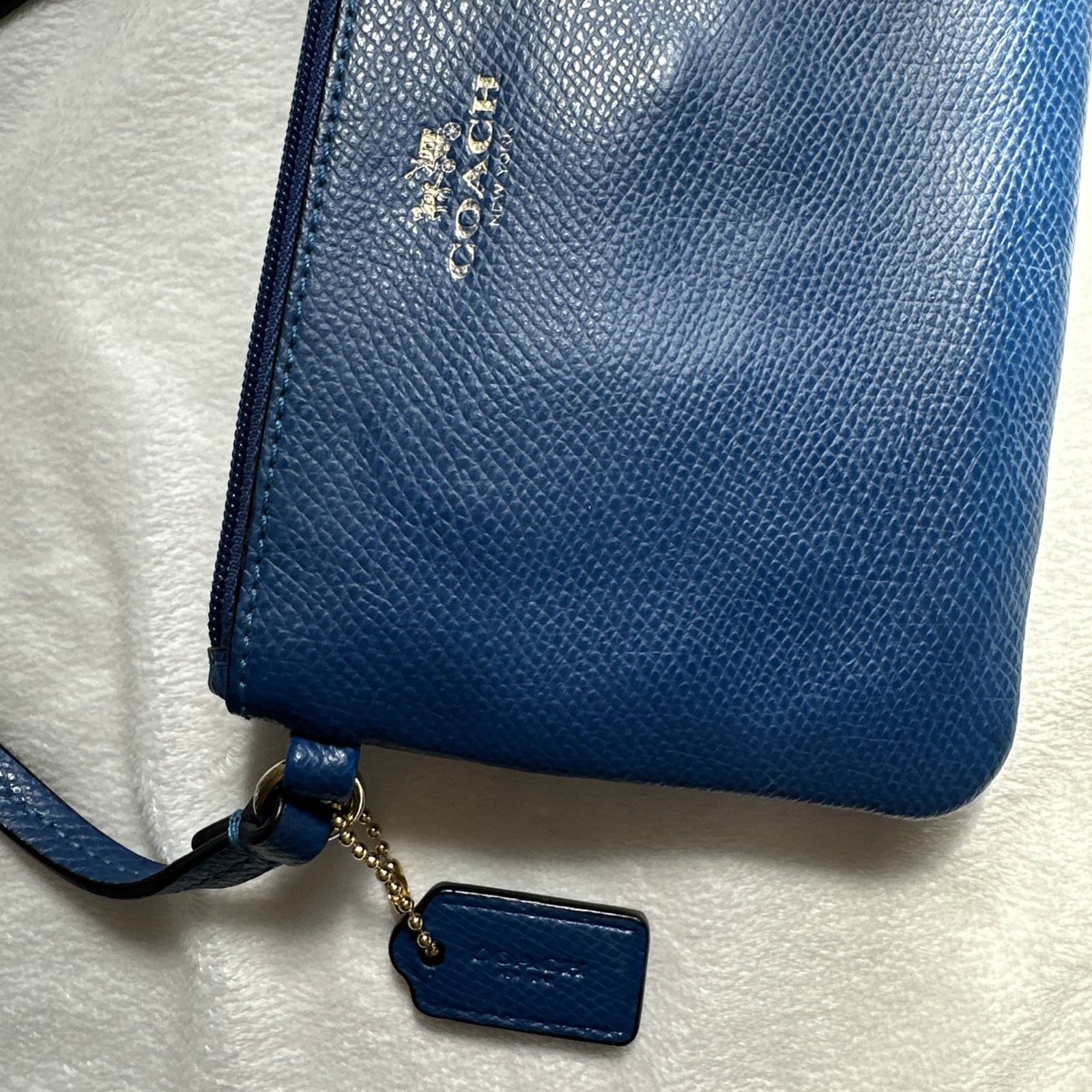 COACH Corner Zip Wristlet In Pebbled Leather Royal Blue