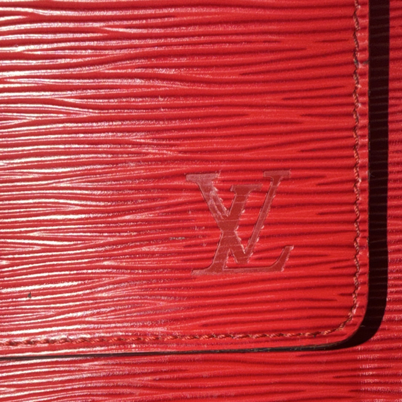 Louis Vuitton Red Epi Monceau 28 Handbag in textured leather/gold-tone hardware