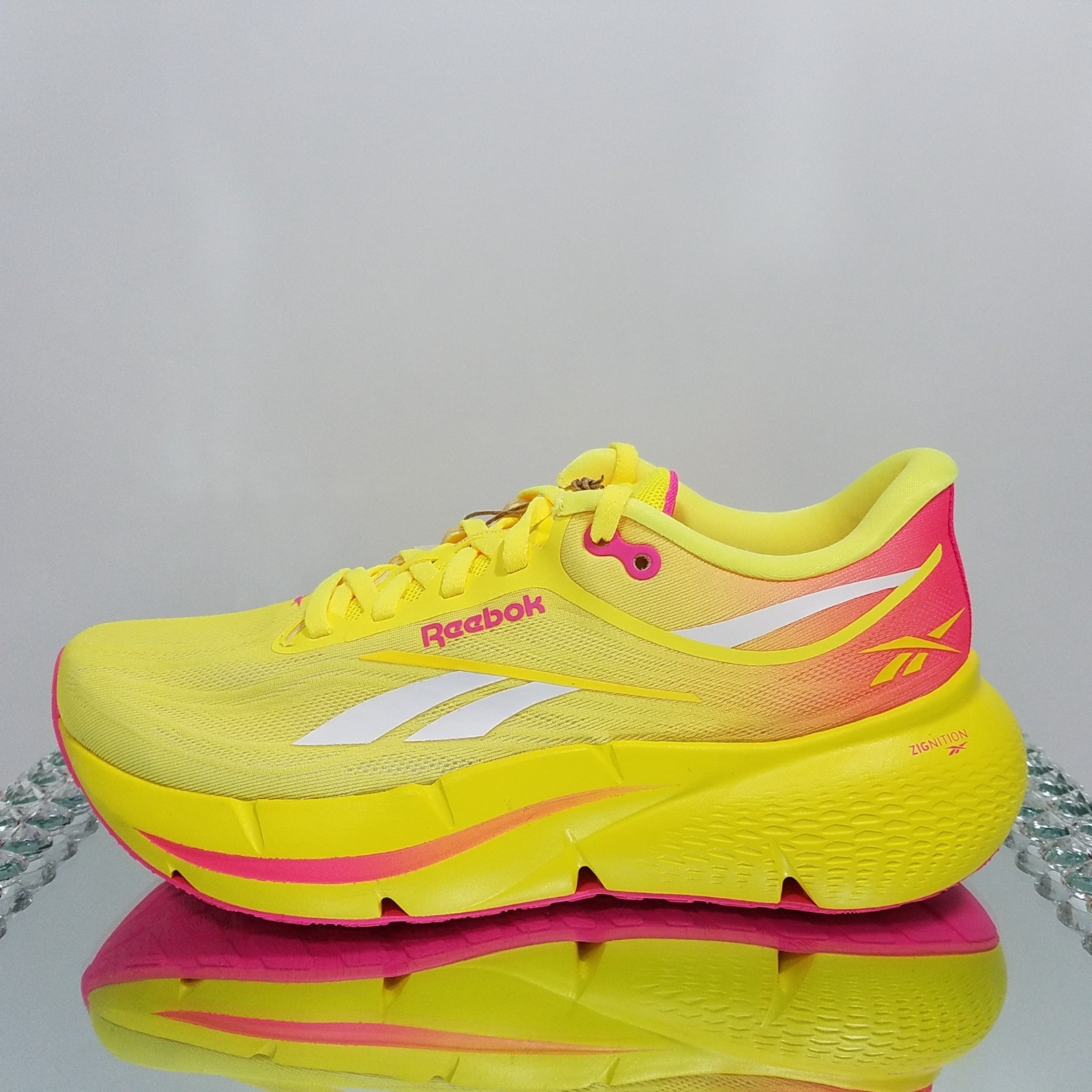 Reebok Zignition “Electric Yellow Atomic Pink” – Women’s Size 7.5 – 100233834