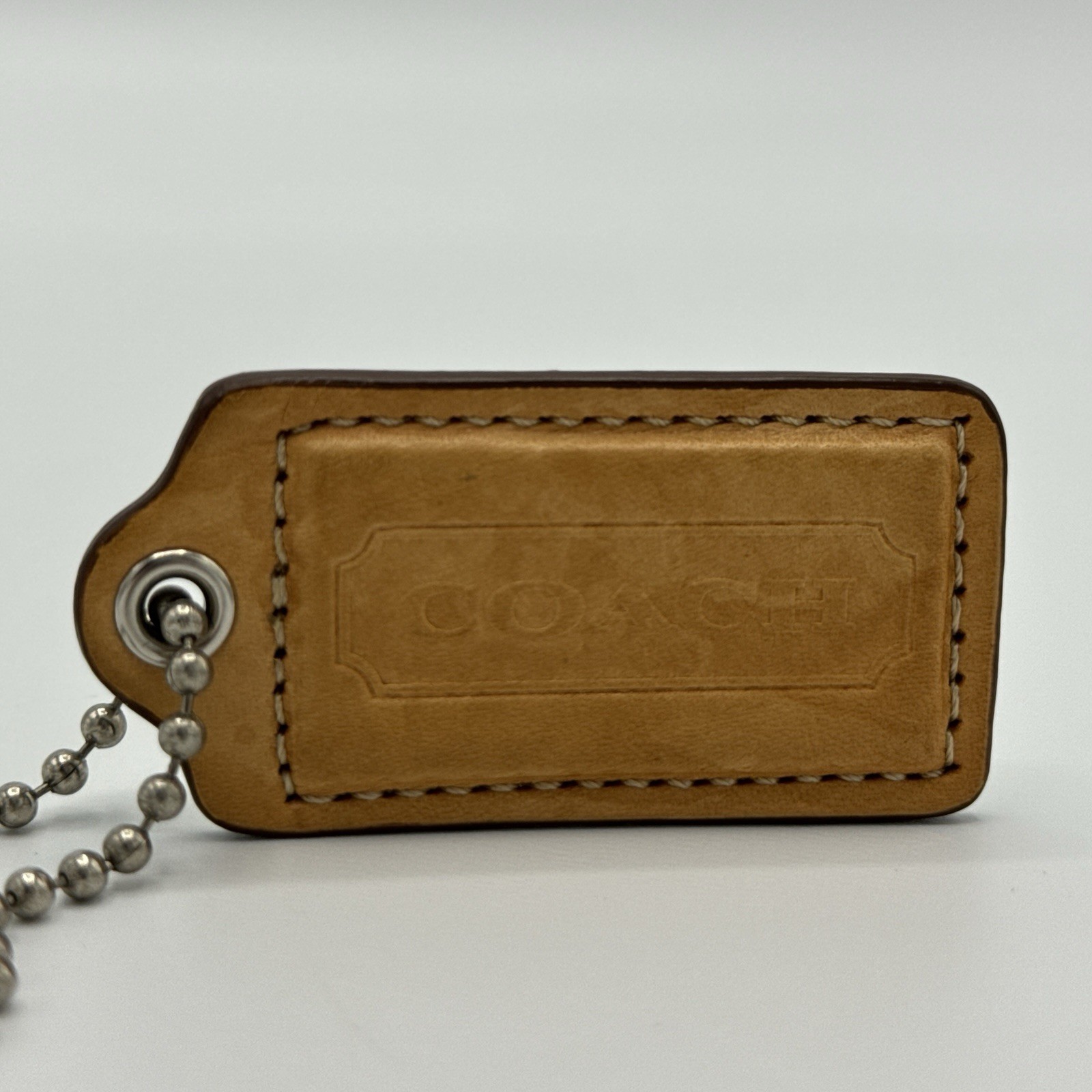 Coach Hang Tag Light Brown Leather Colored 2 & 1/2 Inches Wide / Silver Tone