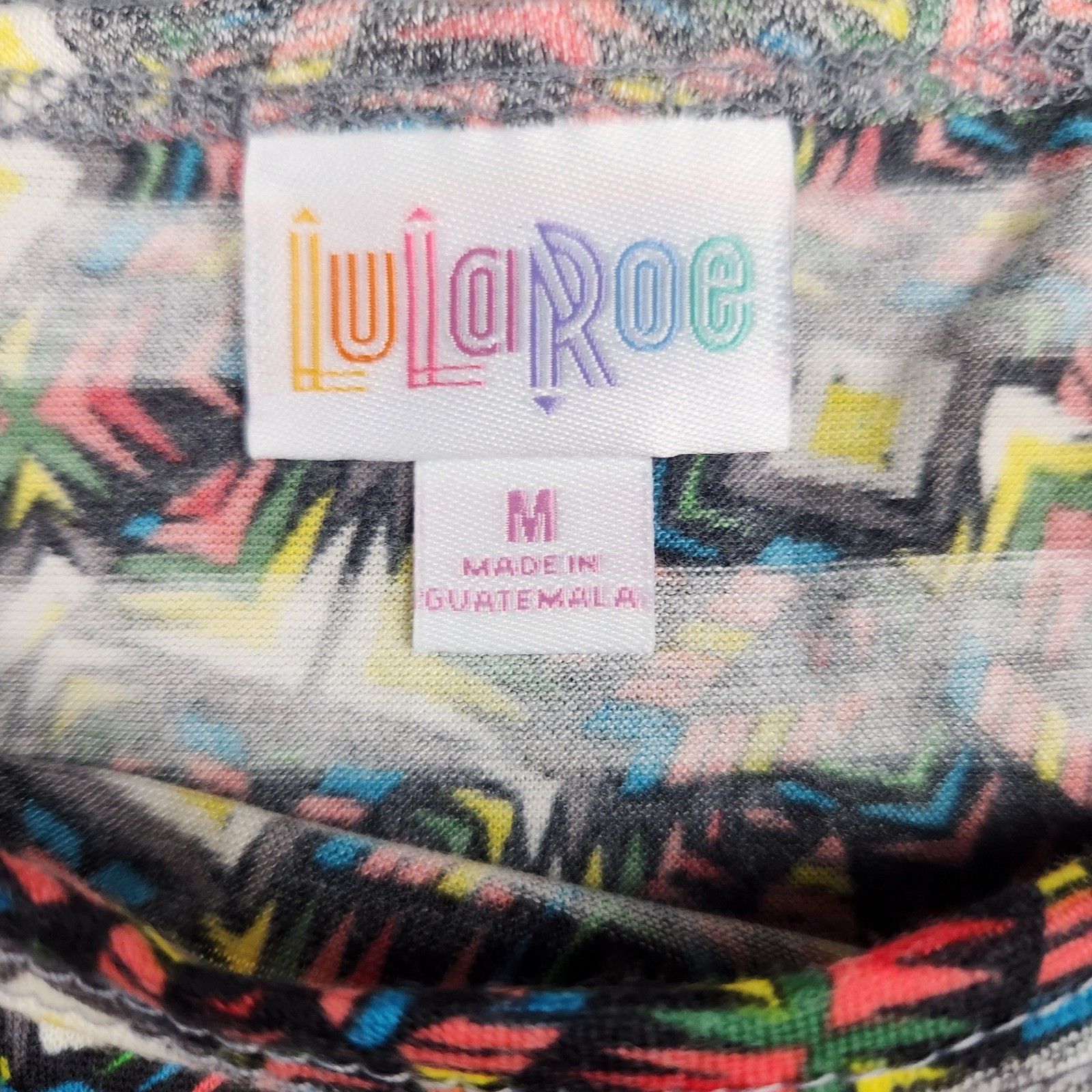 LuLaRoe Irma Tunic Top Womens Medium Multicolor Geometric Stripe High Low NEW