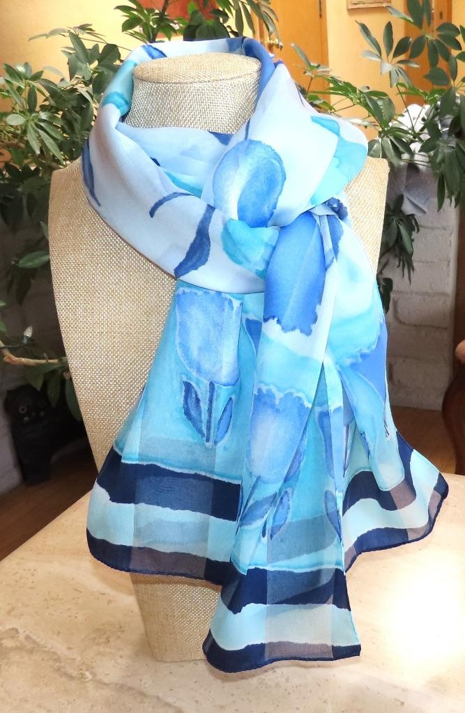 Oblong floral scarf; blue tones, white; 60×14.5 in. Semisheer; poly blend?