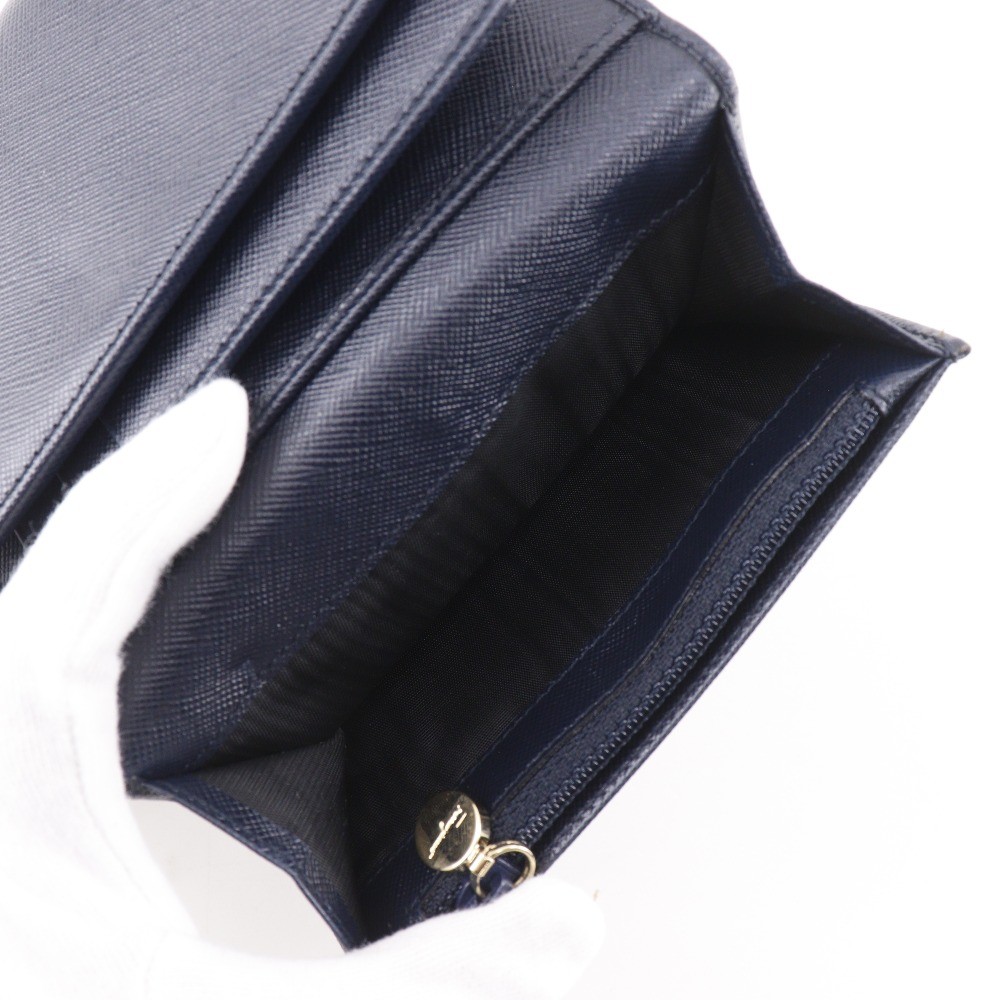Salvatore Ferragamo Leather Trifold Wallet – DUTY FREE