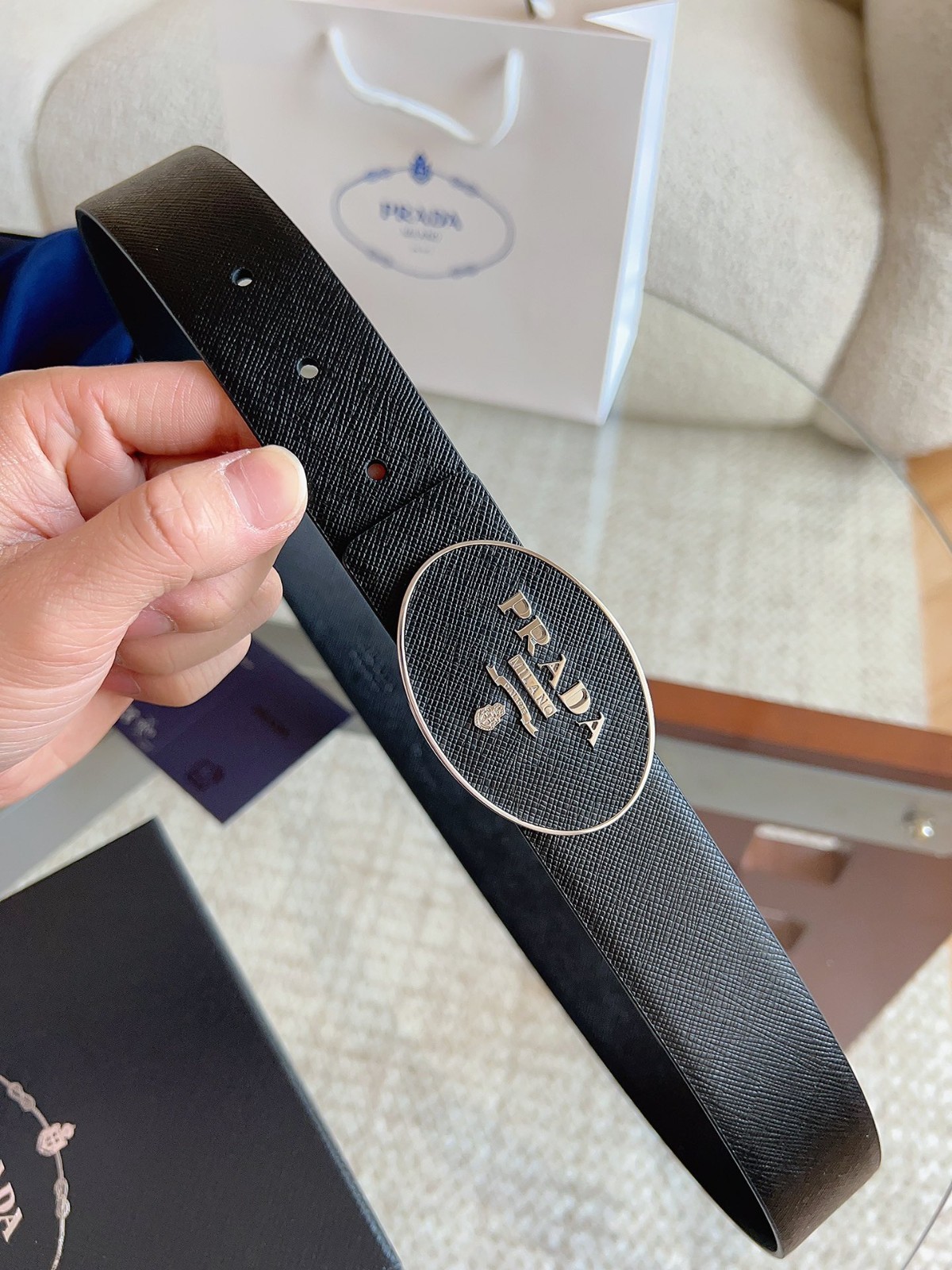 Prada men’s black-button black leather belt