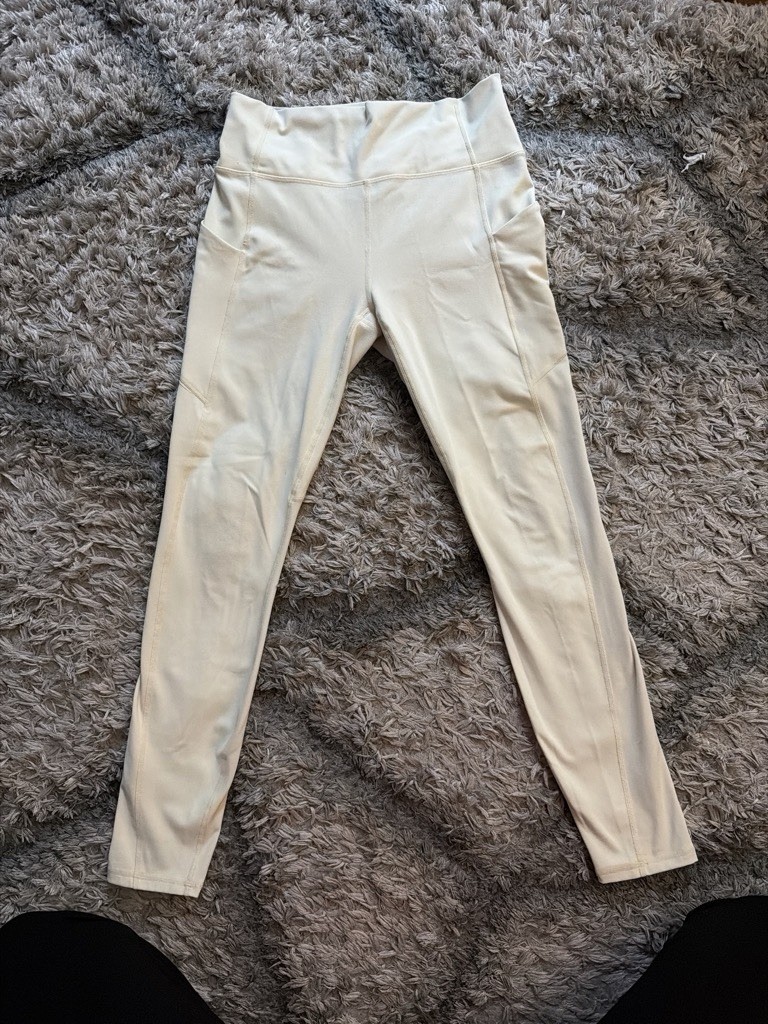 Light yellow Fabletics pureluxe leggings with pockets size Medium