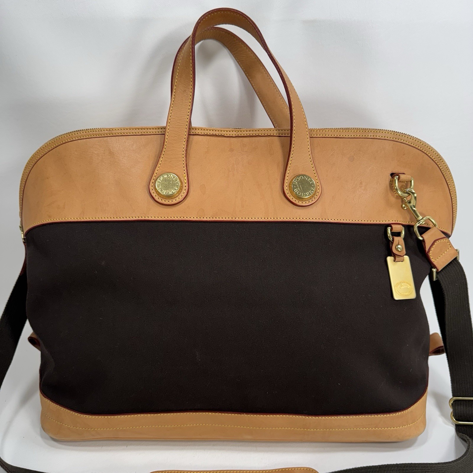 Dooney & Bourke Tan and Black Cabriolet Overnight Travel Bag – See Details