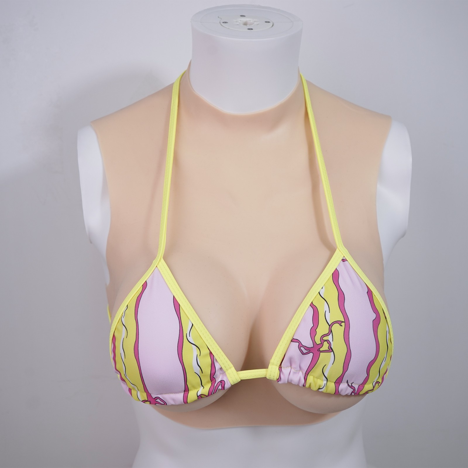 Silicone breasts designed specifically for cross-dressers to enhance bust size.