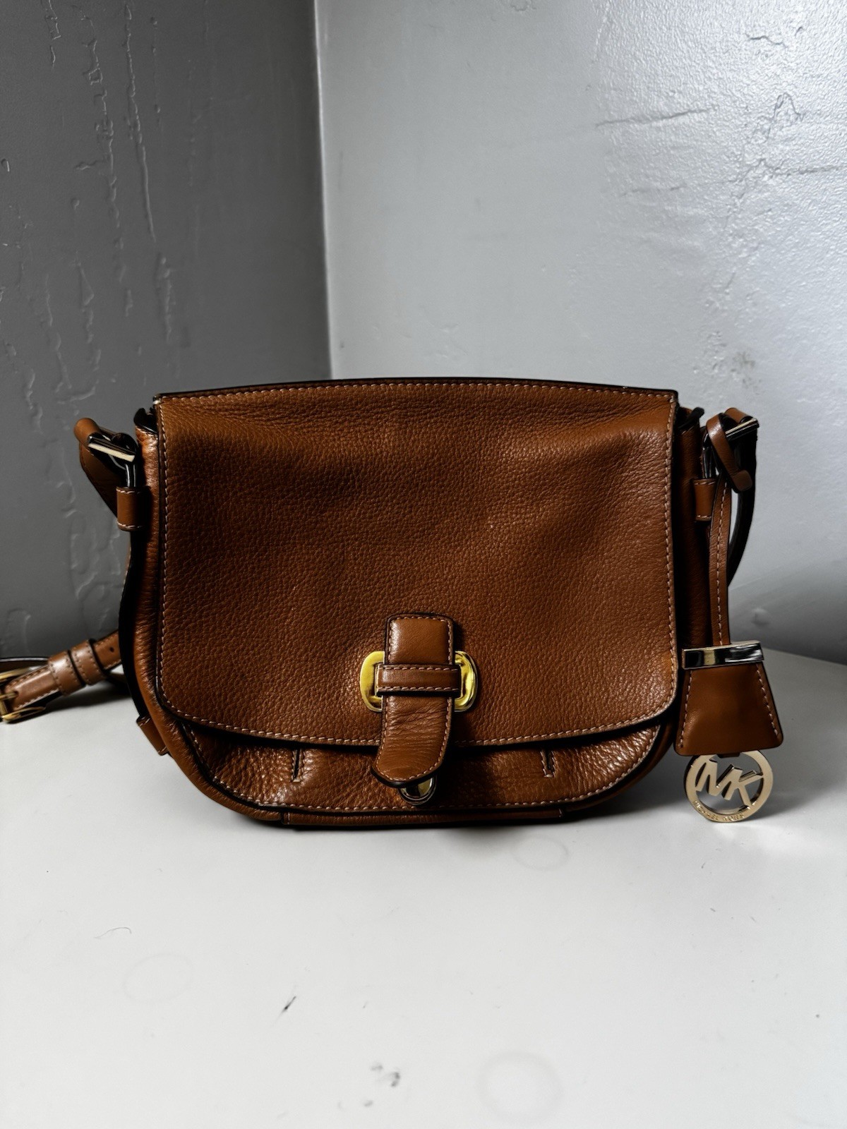 Michael Kors Women’s Brown Pebbled Zip Crossbody Medium Gold MK Charm Bag