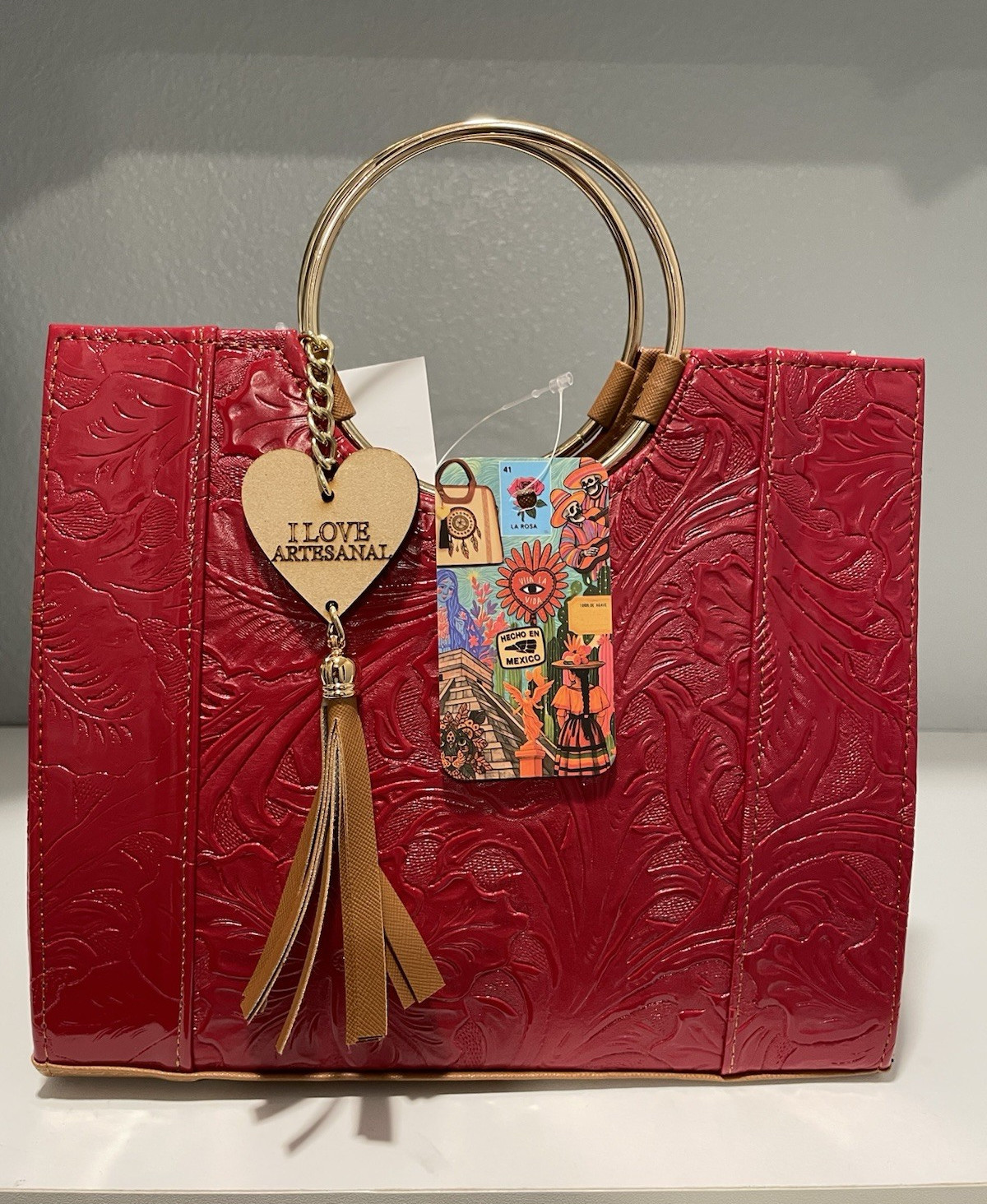 Red Embossed Floral Top Handle Satchel Purse Gold Ring Handles Tassel Charm