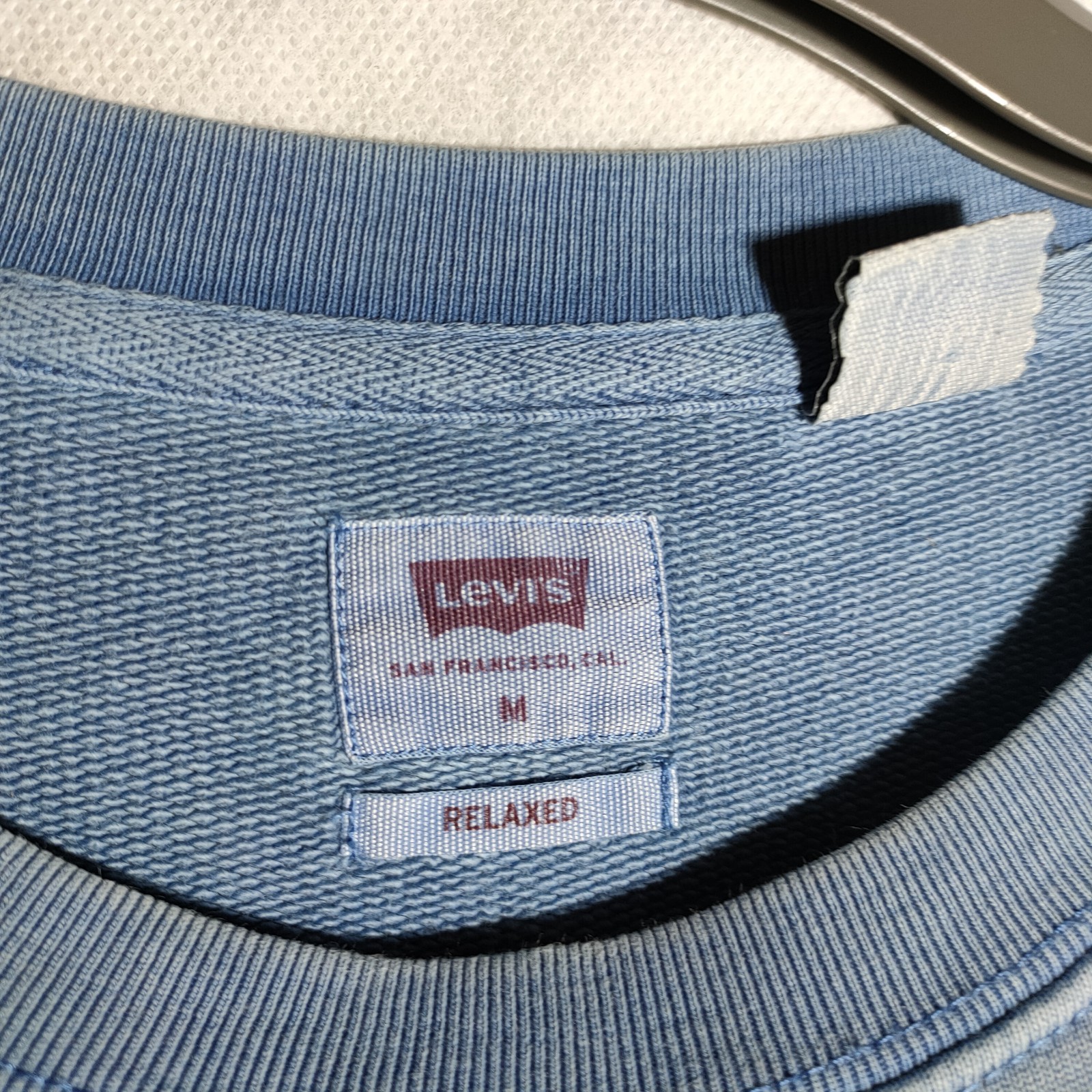 Levi’s Embroidered Sweatshirt Size M Blue Pastel Pink Circular Logo Spellout
