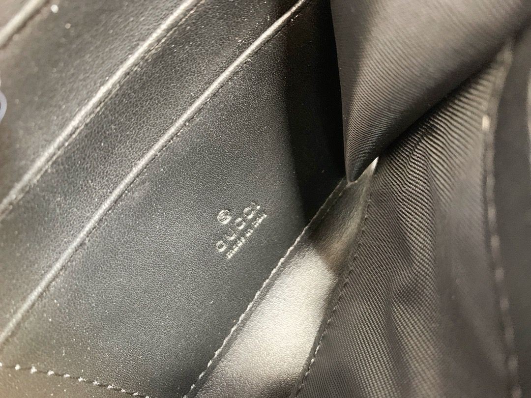 Gucci wallet black with gold GG zip around