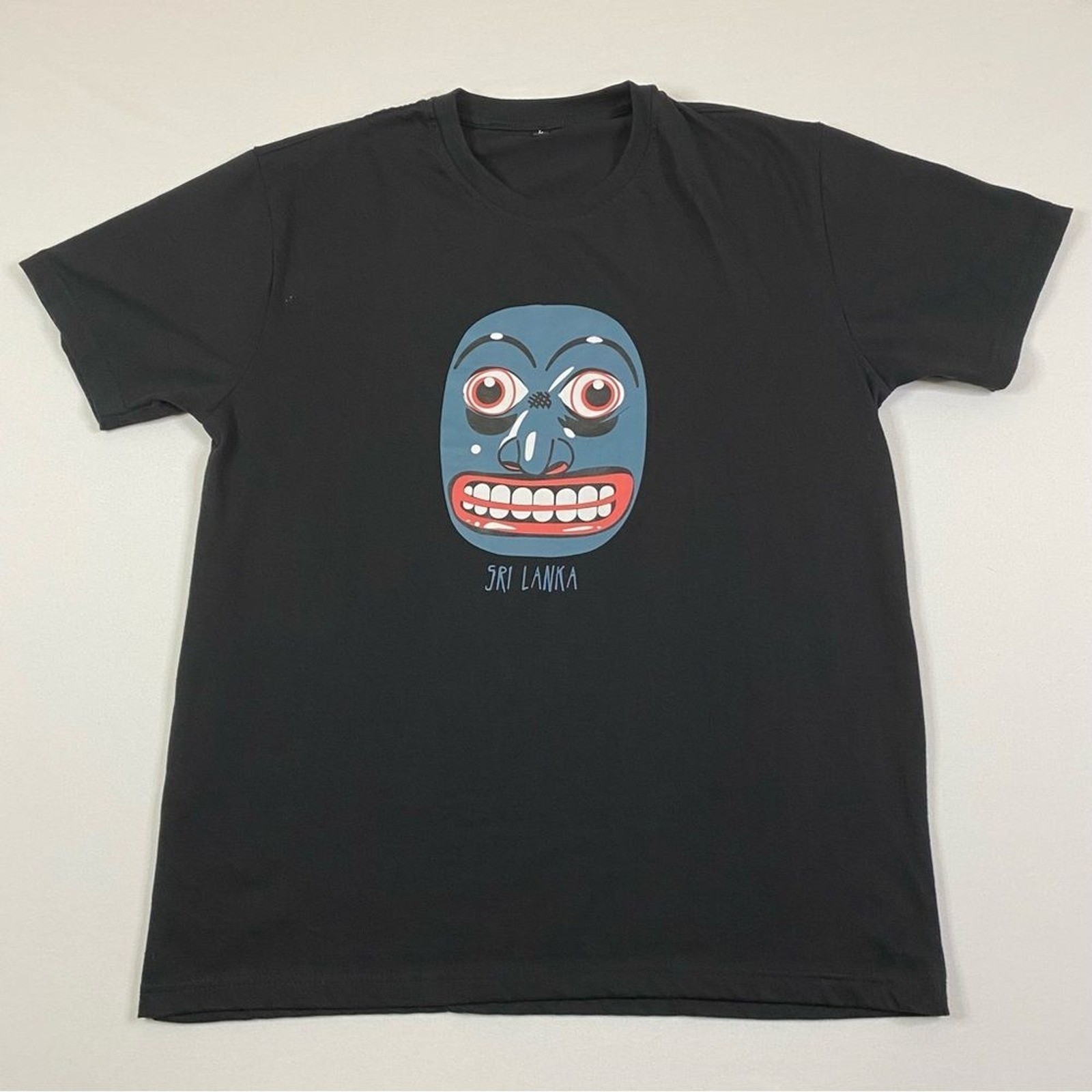 Kurumba Sri Lanka T-Shirt Men’s Large Black Short Sleeve Raksha Sanni Kolam Mask