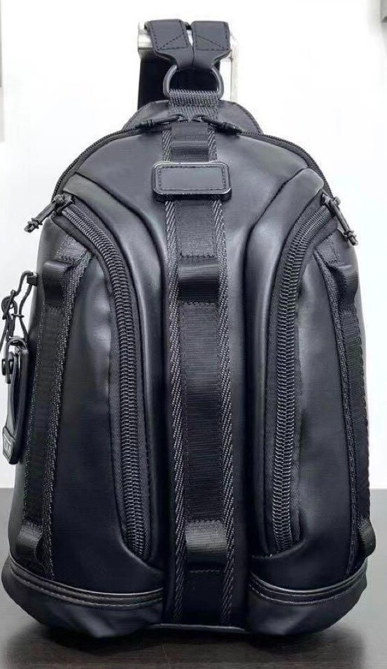 NEW TUMI 932743 Black Knight Sling Body Bag compact Backpack leather New