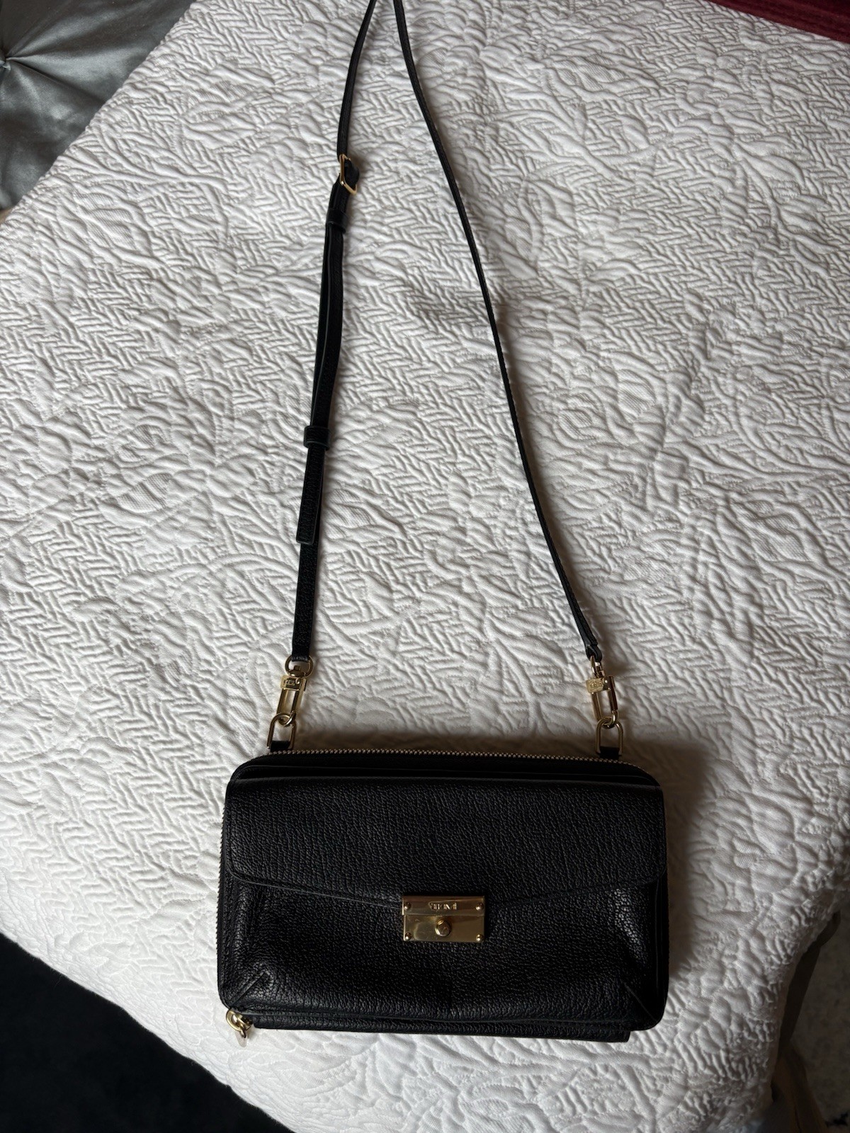 TUMI Black Pebbled Zip-Around Crossbody Wallet Bag Gold Hardware, Card Slots