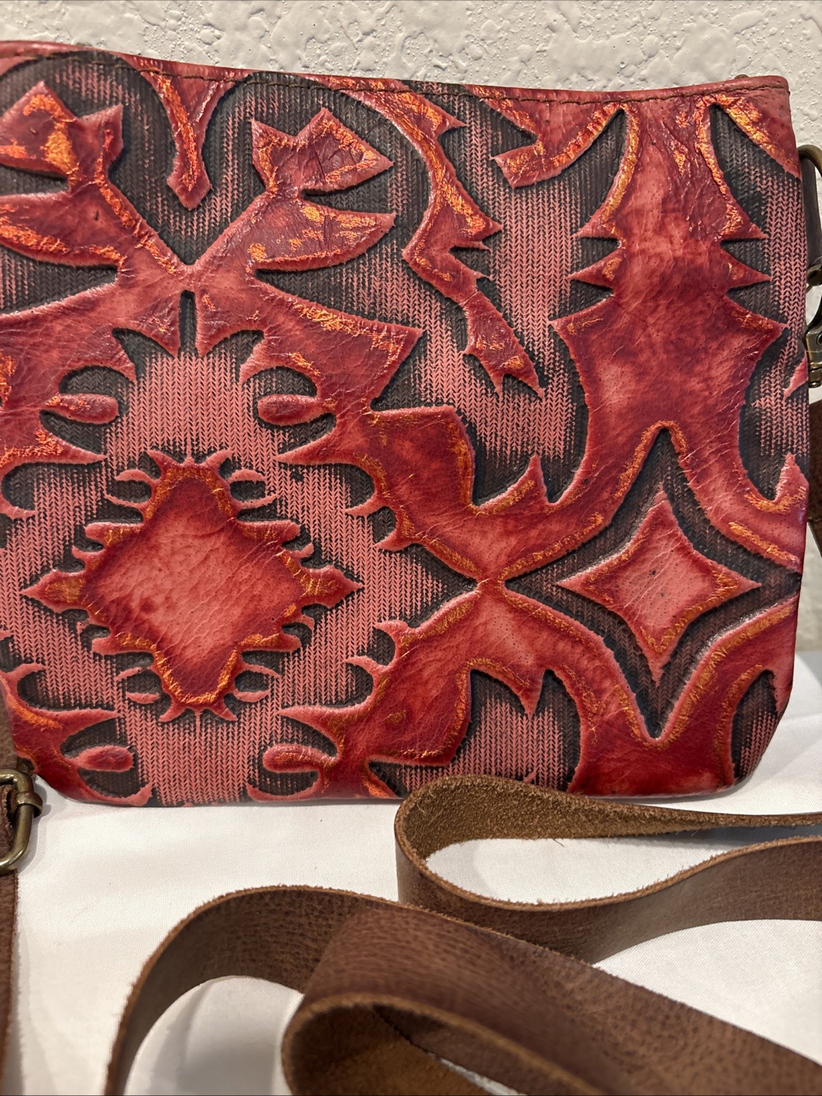 Red Embossed Leather Crossbody Bag With Adjustable Strap. 6.75Hx7.5L