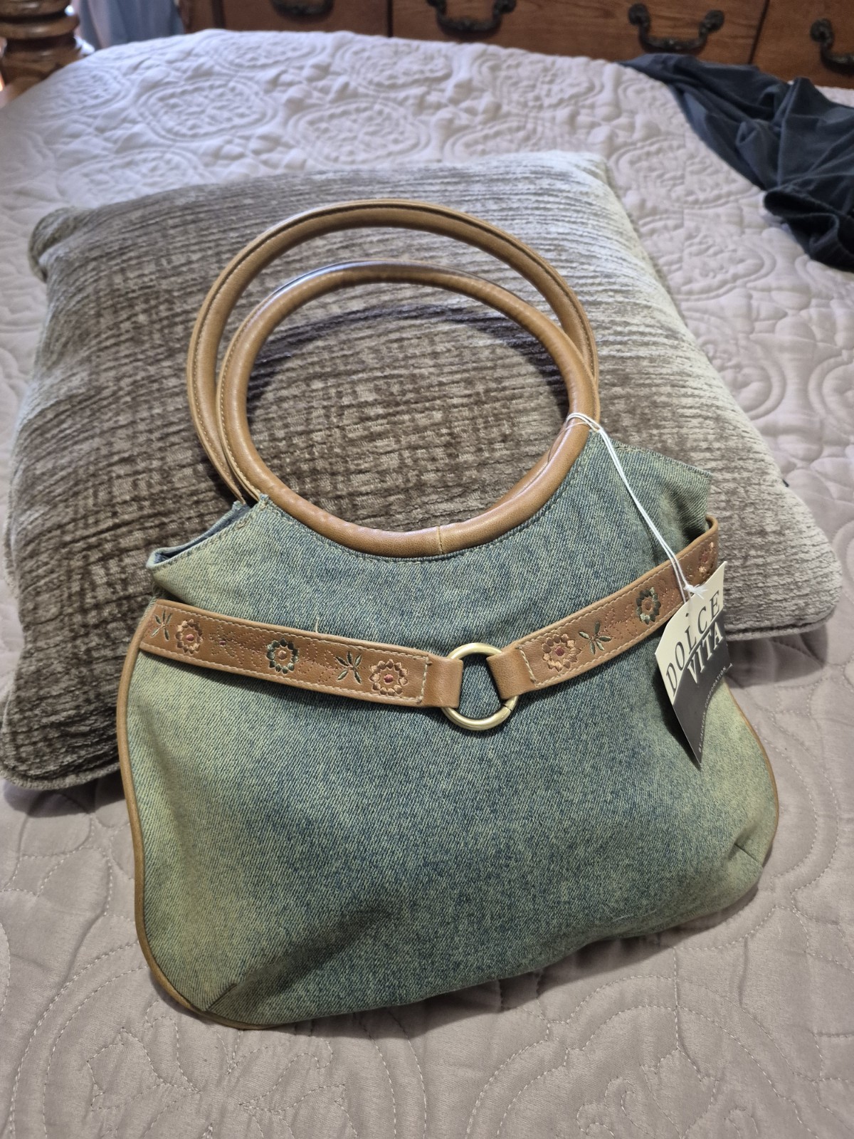Dolce Vita light blue denim handbag with brown leather accents and floral embroi