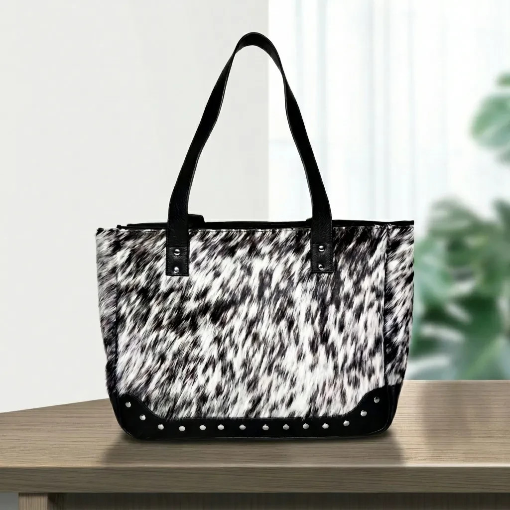 natural-black-and-white-speckled-hair-on-cowhide-leather-bag