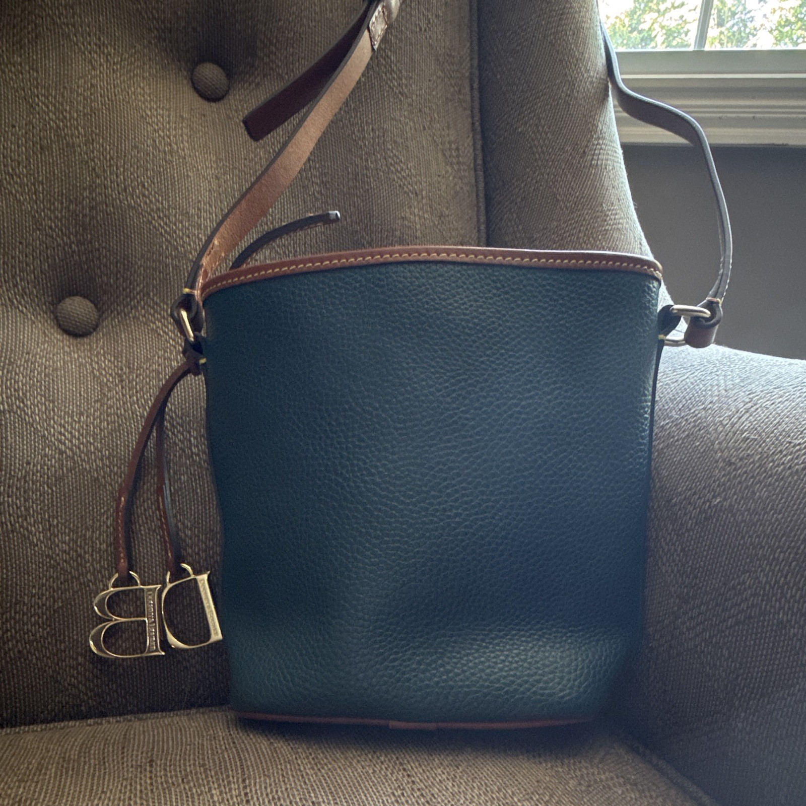 Dooney & Bourke Pebble Grain Blue/Brown Crossbody Zip, Adjustable Strap, Pockets