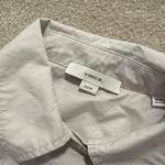 Vince white short-sleeve button-up shirt with a clean minimalist look Women