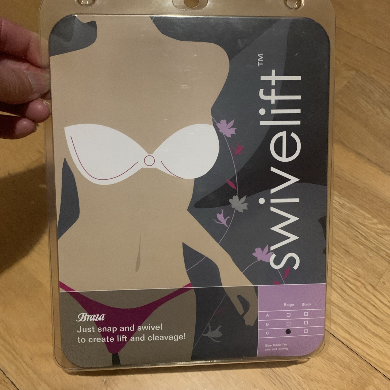 Braza Swivelift Re-Usable Adhesive Bra to create lift and cleavage. Cup C