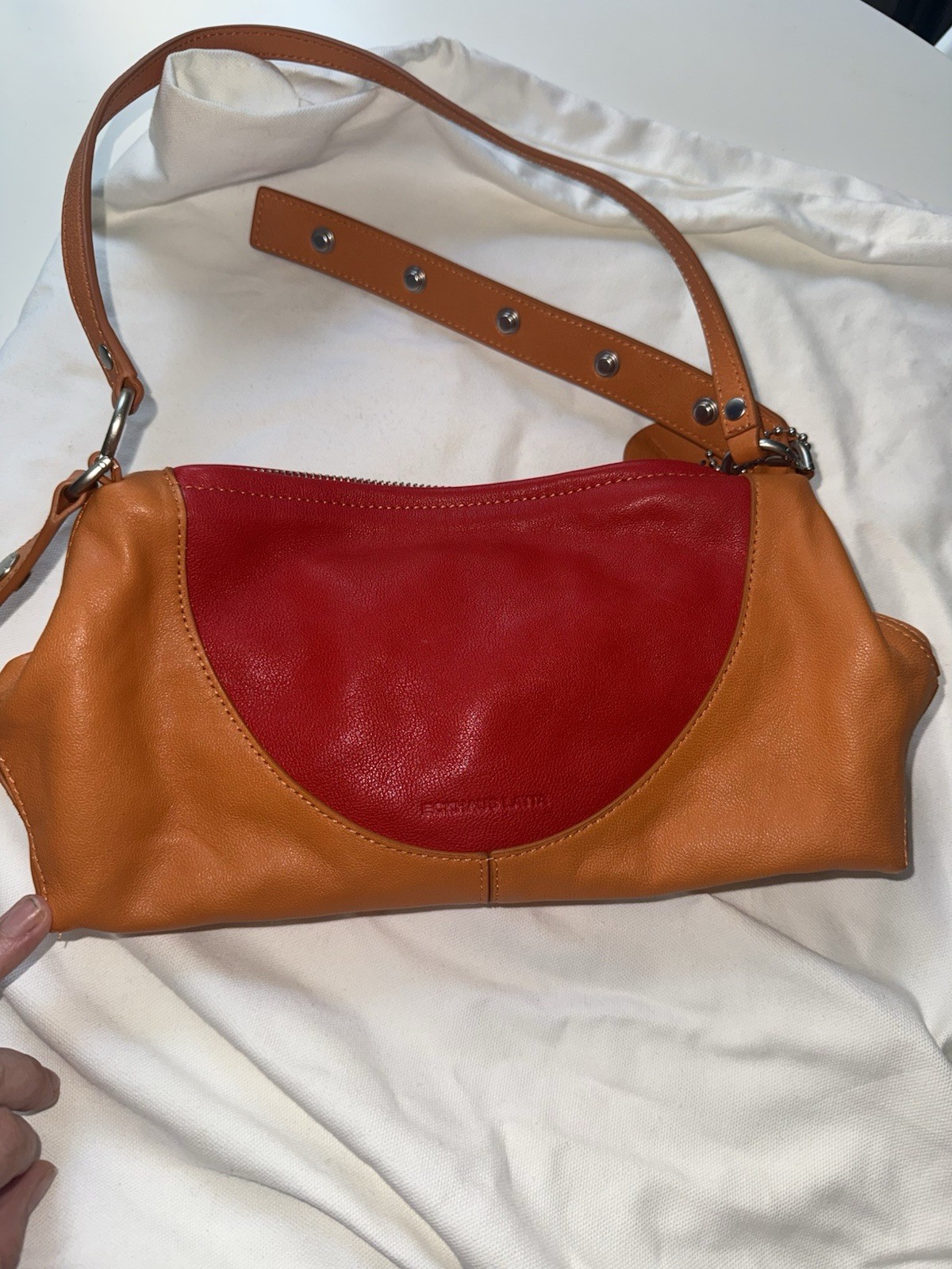 Eckhaus Latta The Crescent SS26 Orange/Red with dust bag