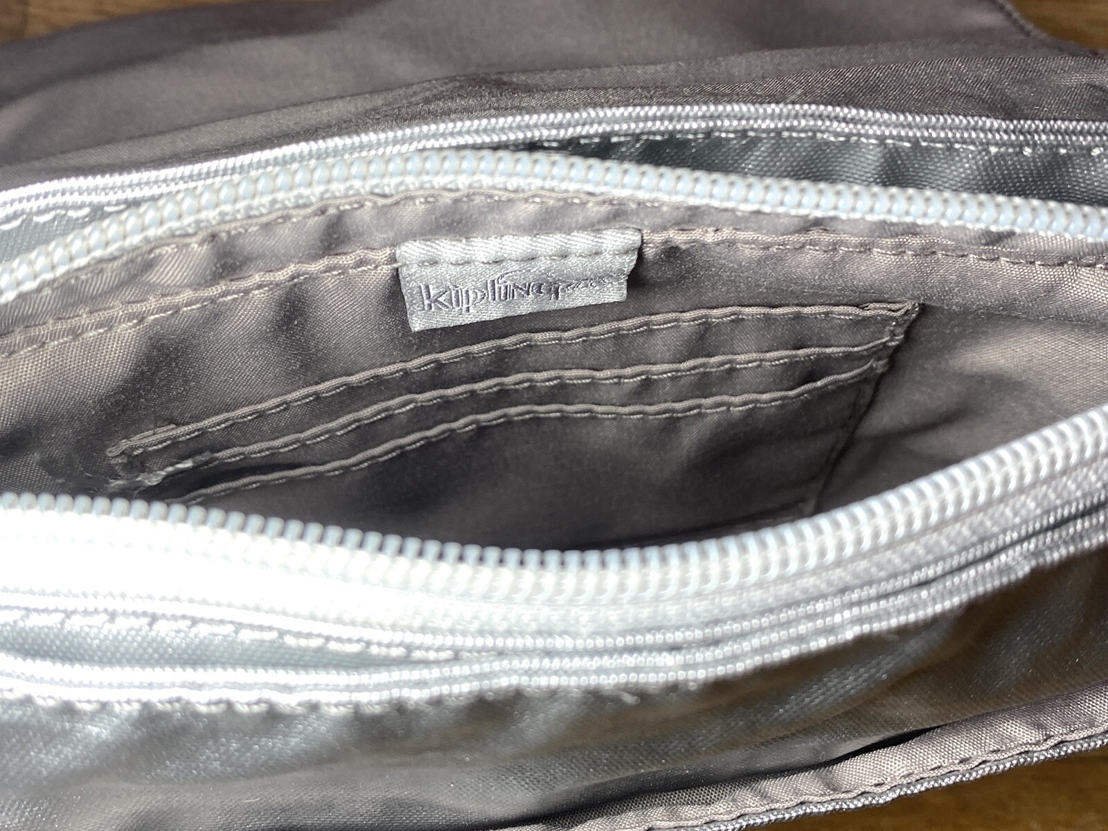 Kipling AC8601 – Selene Platinum Metallic Women’s Wristlet – New!