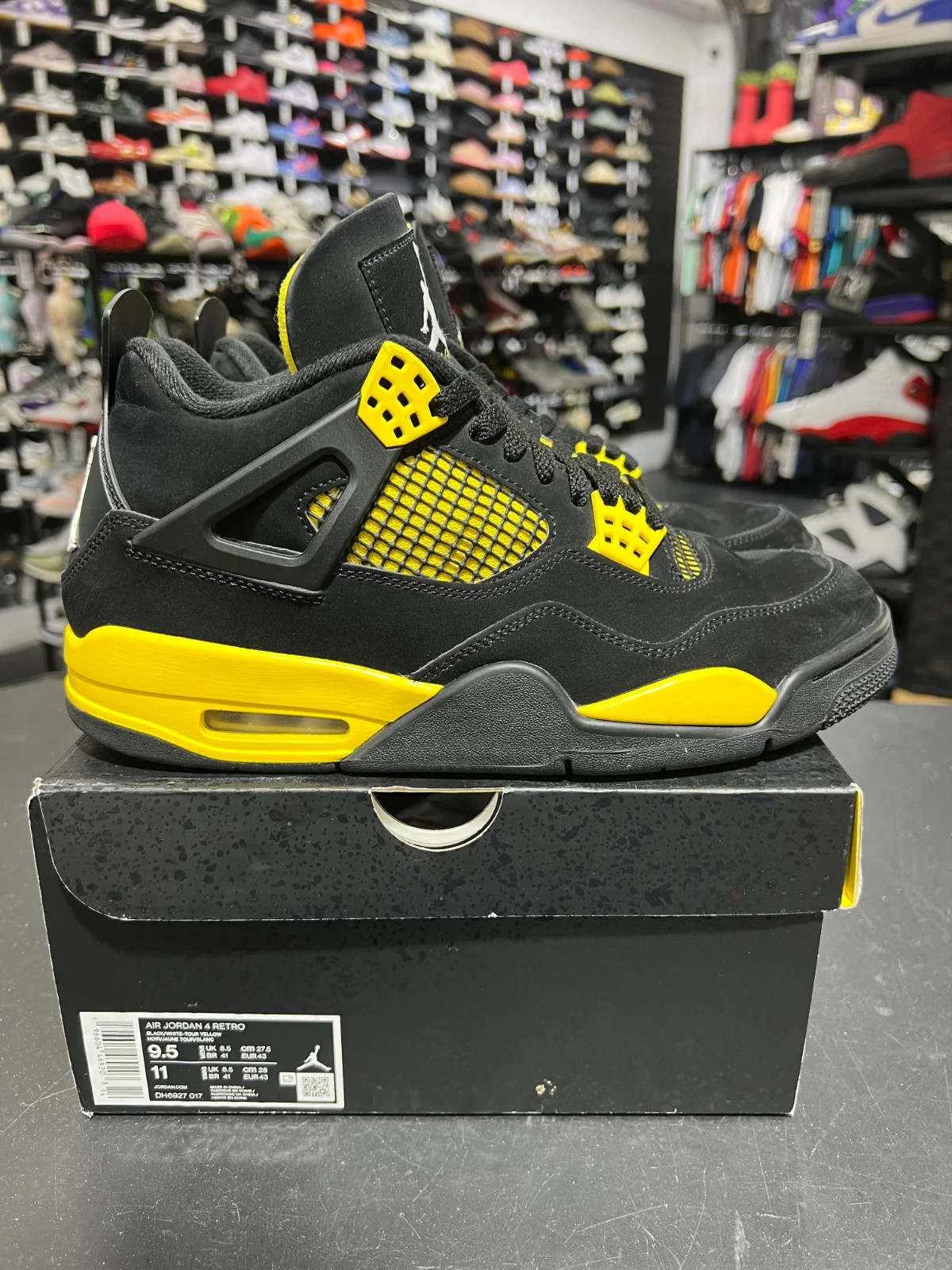 Size 9.5 – Jordan 4 Retro Mid Thunder PRE-OWNED
