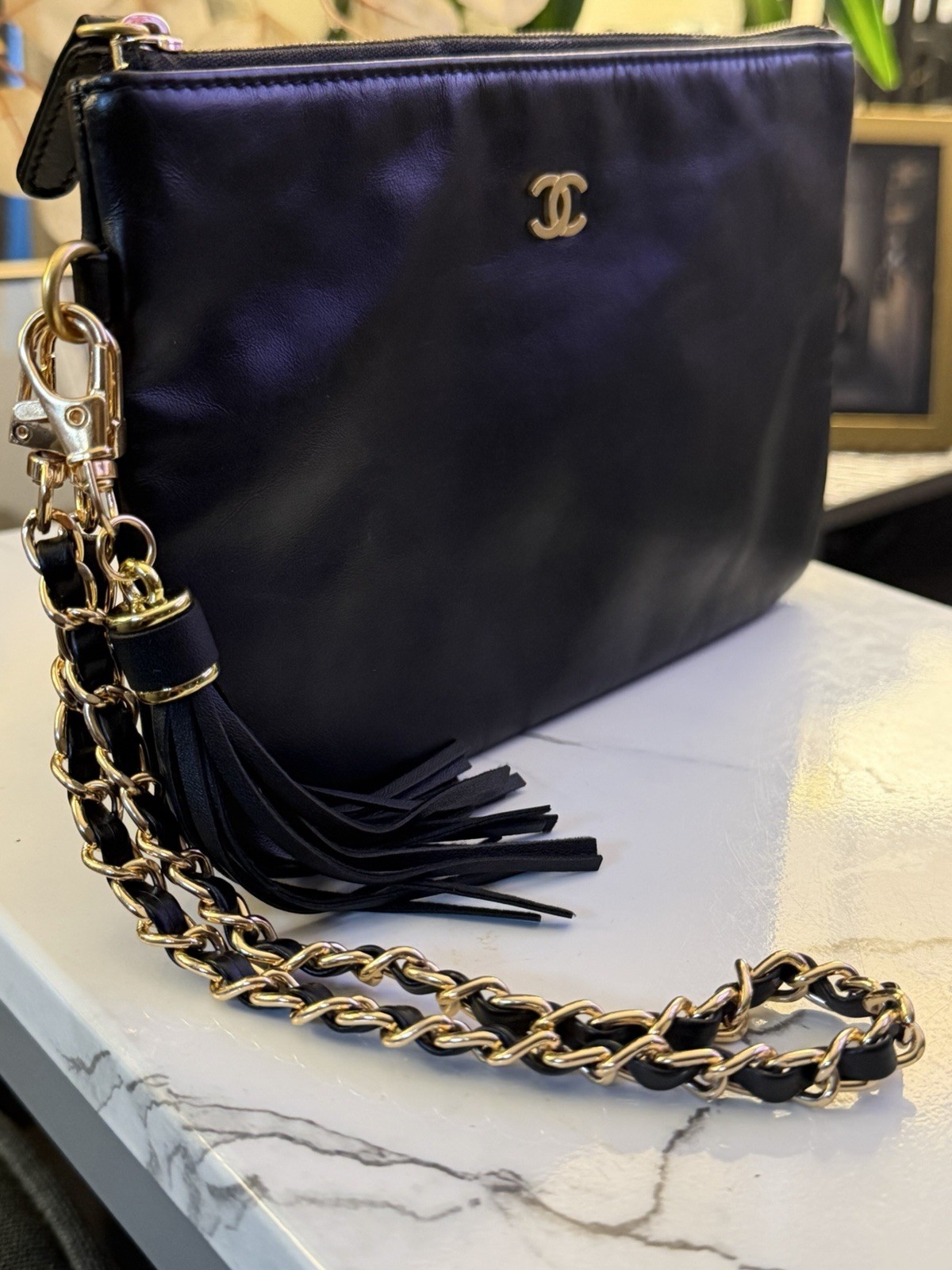 CHANEL Black Quilted Zip Clutch Wrist Strap Chain Tassel Gold CC Logo