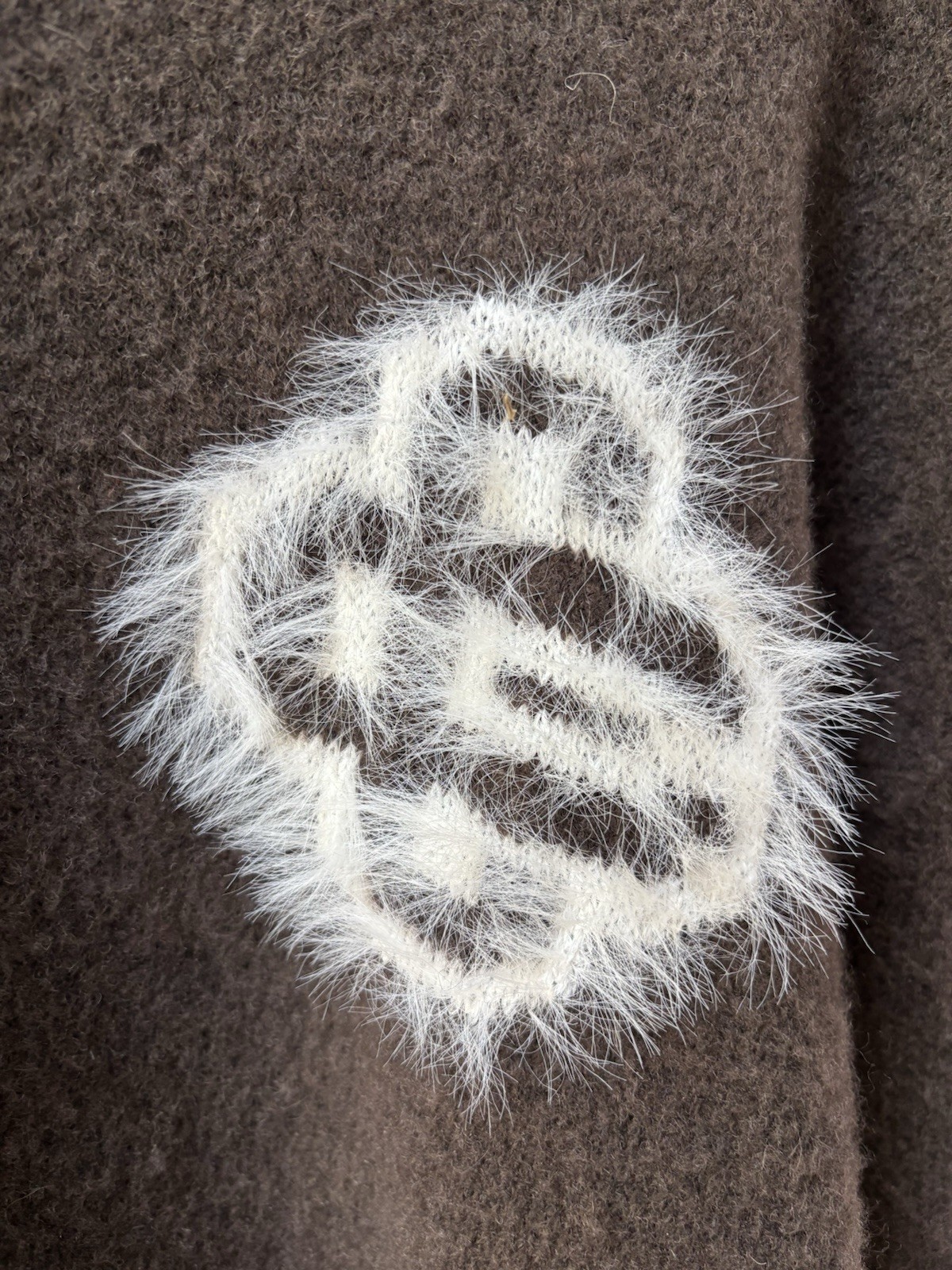 The Couture Club ‘Monogram Fluffy Emblem Zip-Through Knitted Hoodie’