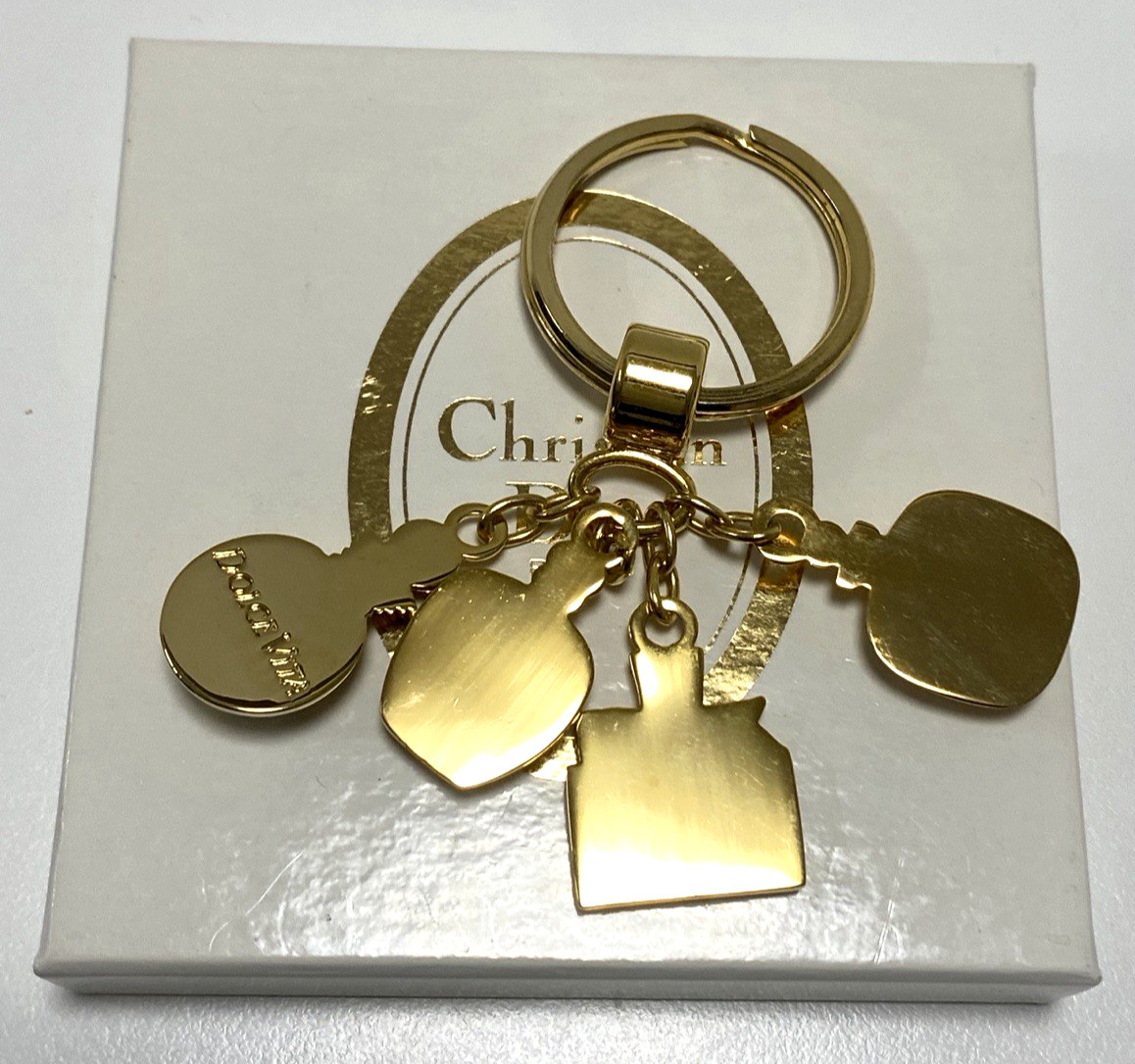 Dior novelty key chain bag charm key holder gold color brand near mint condition