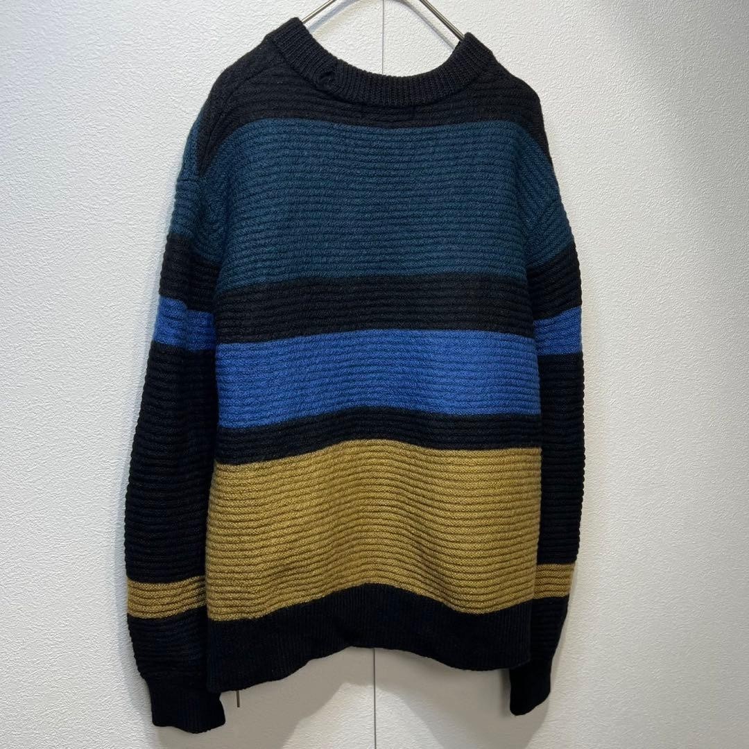 CULLNI Wool striped knit sweater with side zip design