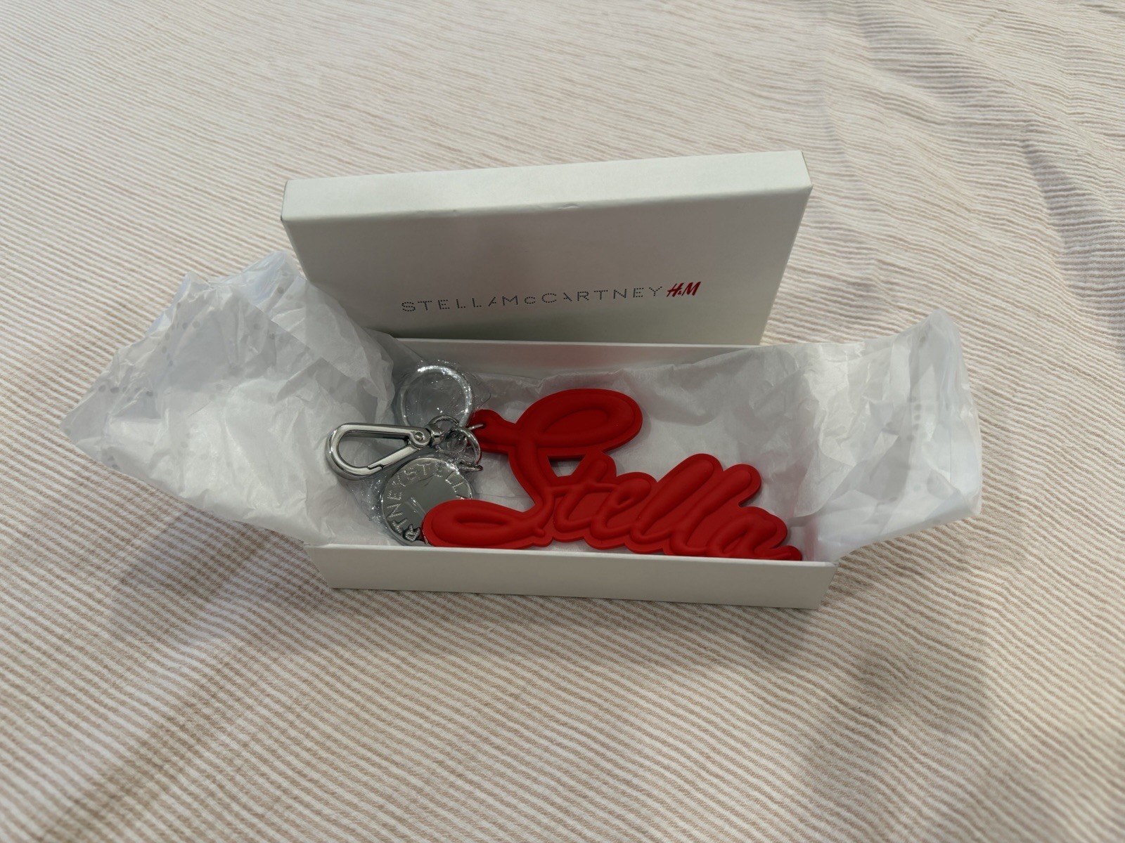 Brand New with tags Stella McCartney x H&M collab red Stella bag charm