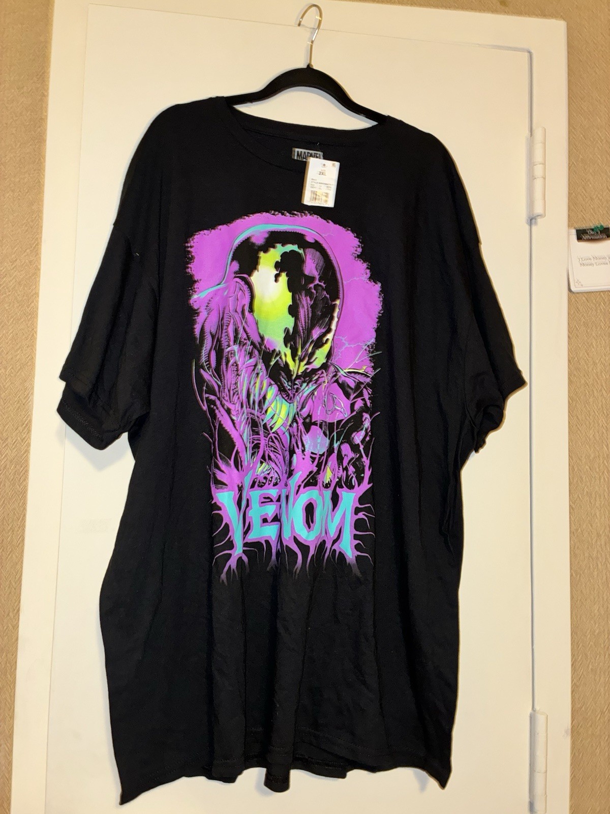 Marvel: black crewneck tee with vibrant neon purple, green, and teal Venom print