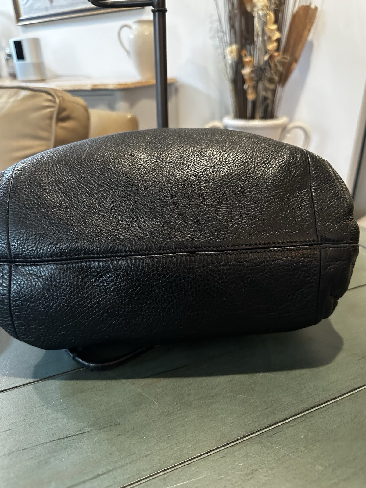 Coach Avery bucket bag. Drawstring closure and silver-tone hardware.