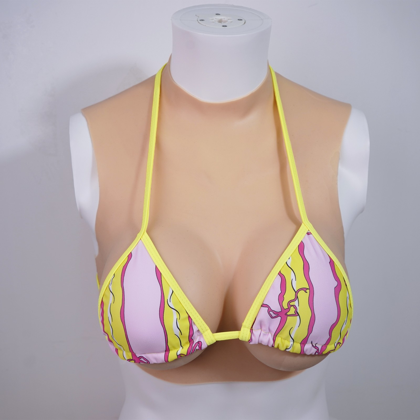 Silicone breast pads, fake breasts, transvestism, transgender role-playing