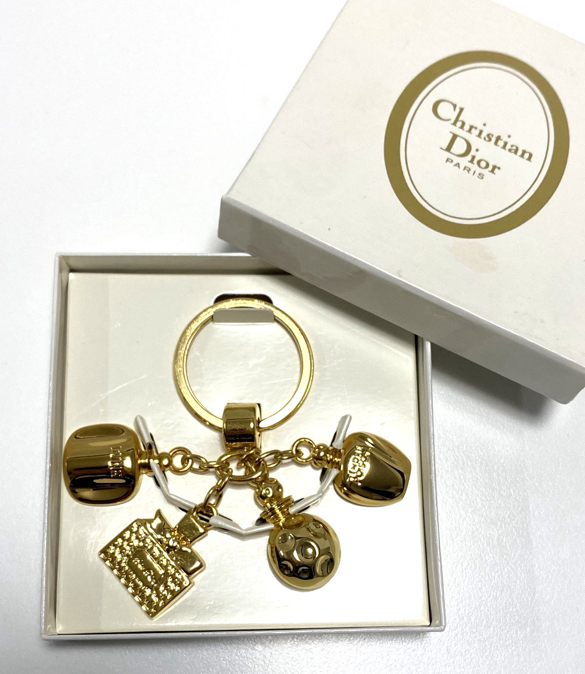 Dior novelty key chain bag charm key holder gold color brand near mint condition