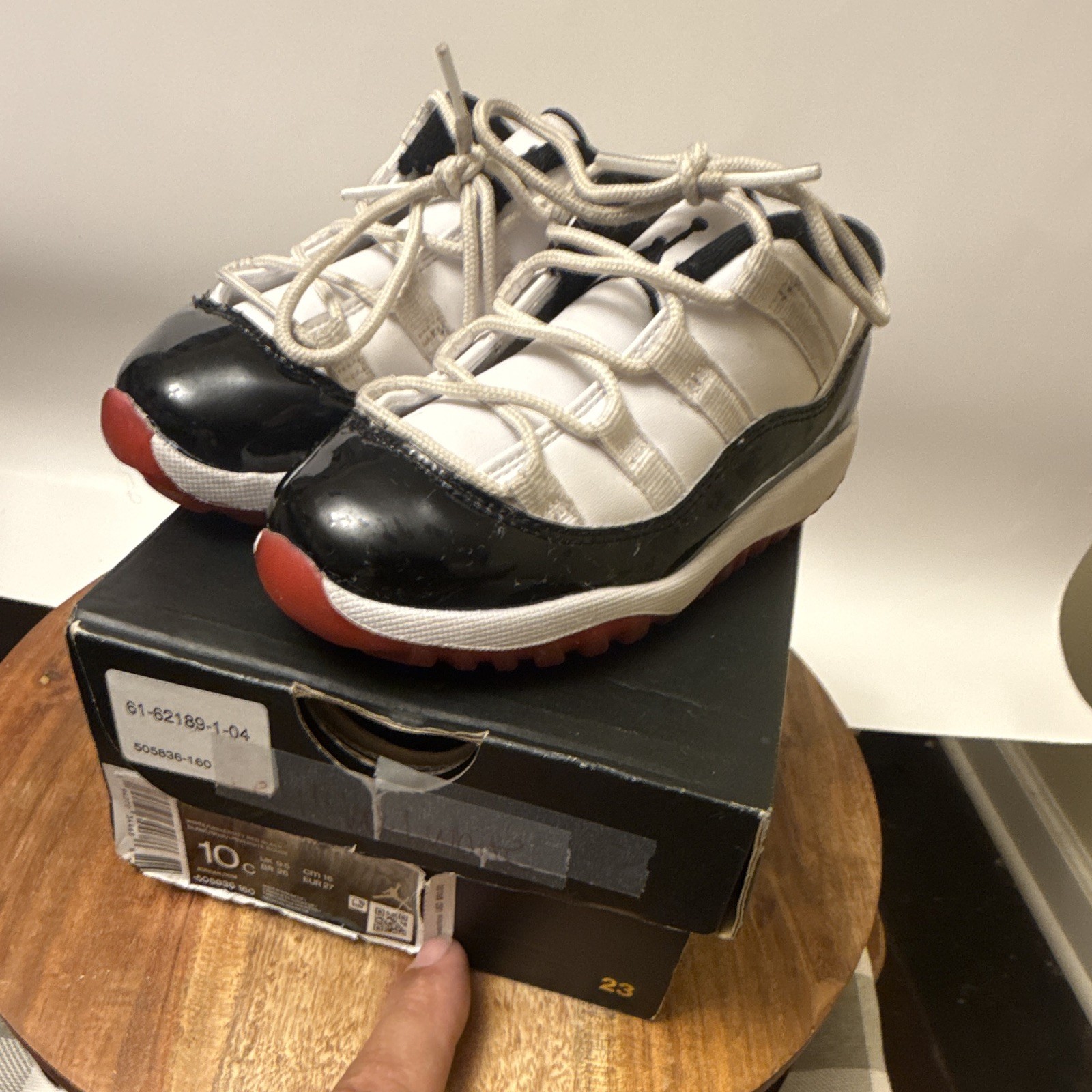 Jordan Jordan 11 Low Unisex Kids Athletic Sneaker White/Black/Red US 10C