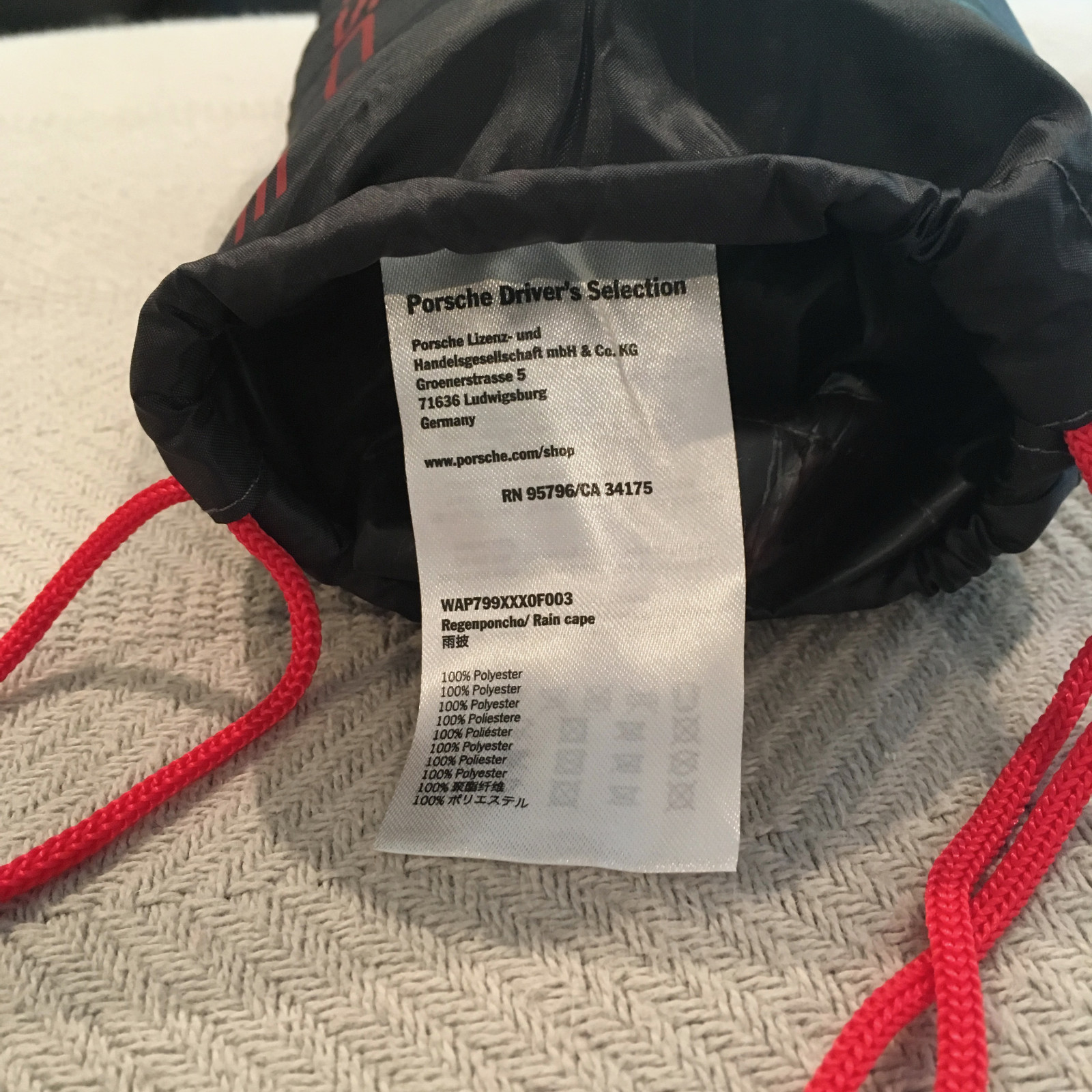 PORSCHE DESIGN PCNA PORSCHE RACING RAIN CAPE PONCHO W/SEWN IN STORAGE POUCH. NEW