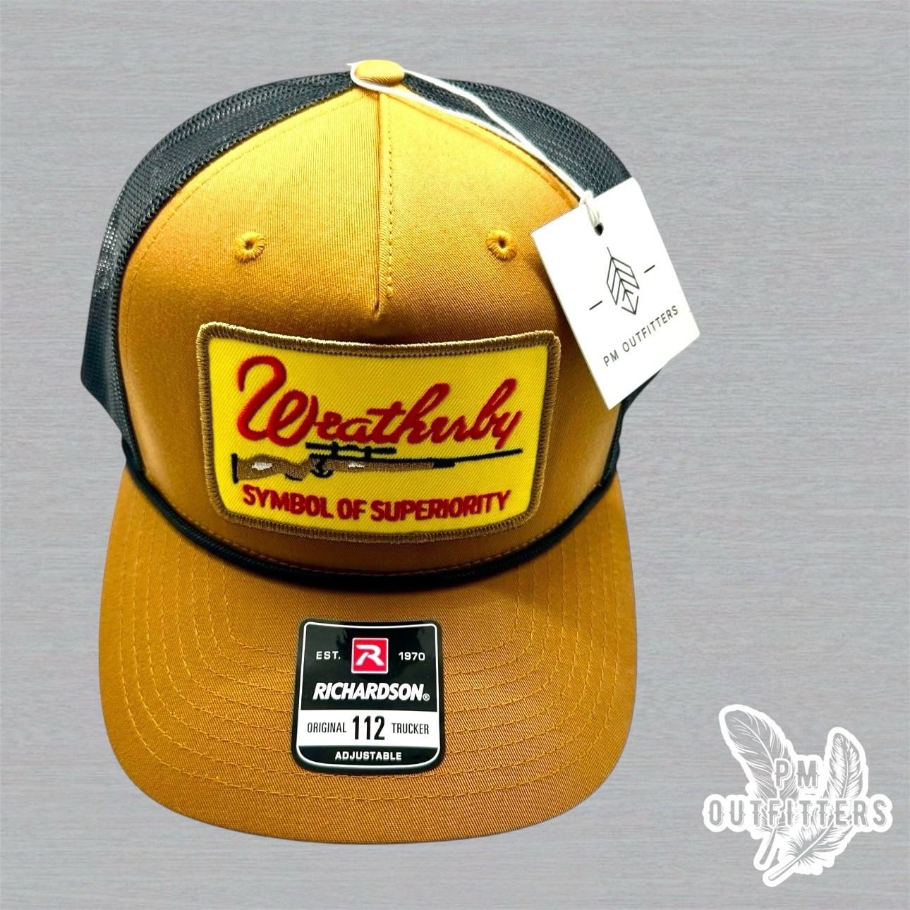 Retro Weatherby Firearms Embroidered Patch on Richardson 112 Rope Trucker Hat