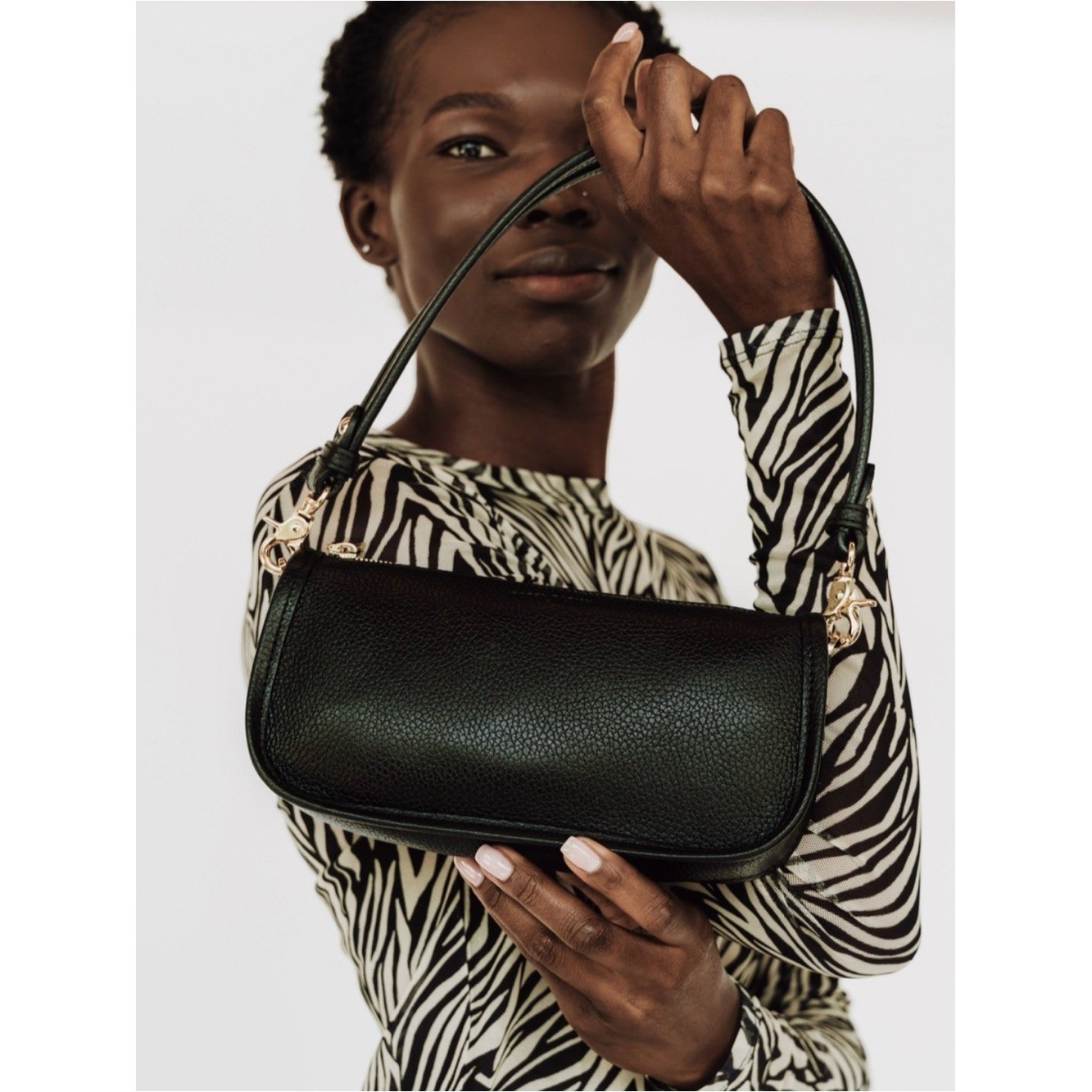 Poppy Barley The classic baguette black leather bag